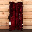Puma Ocean Turquoise hardshell guitar case with burgundy crushed velvet interior and brass hardware