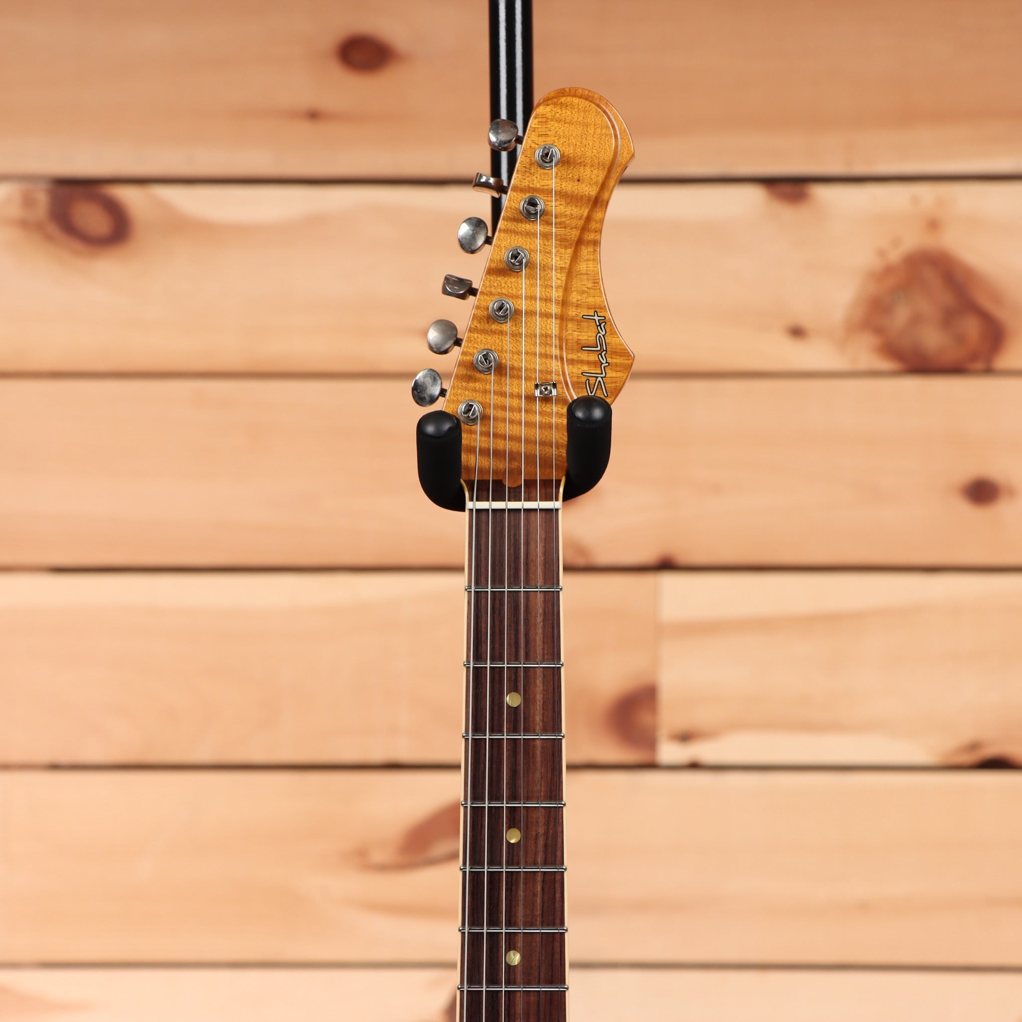 Shabat Namm Puma Ocean Turquoise electric guitar with flame maple top and rosewood fretboard