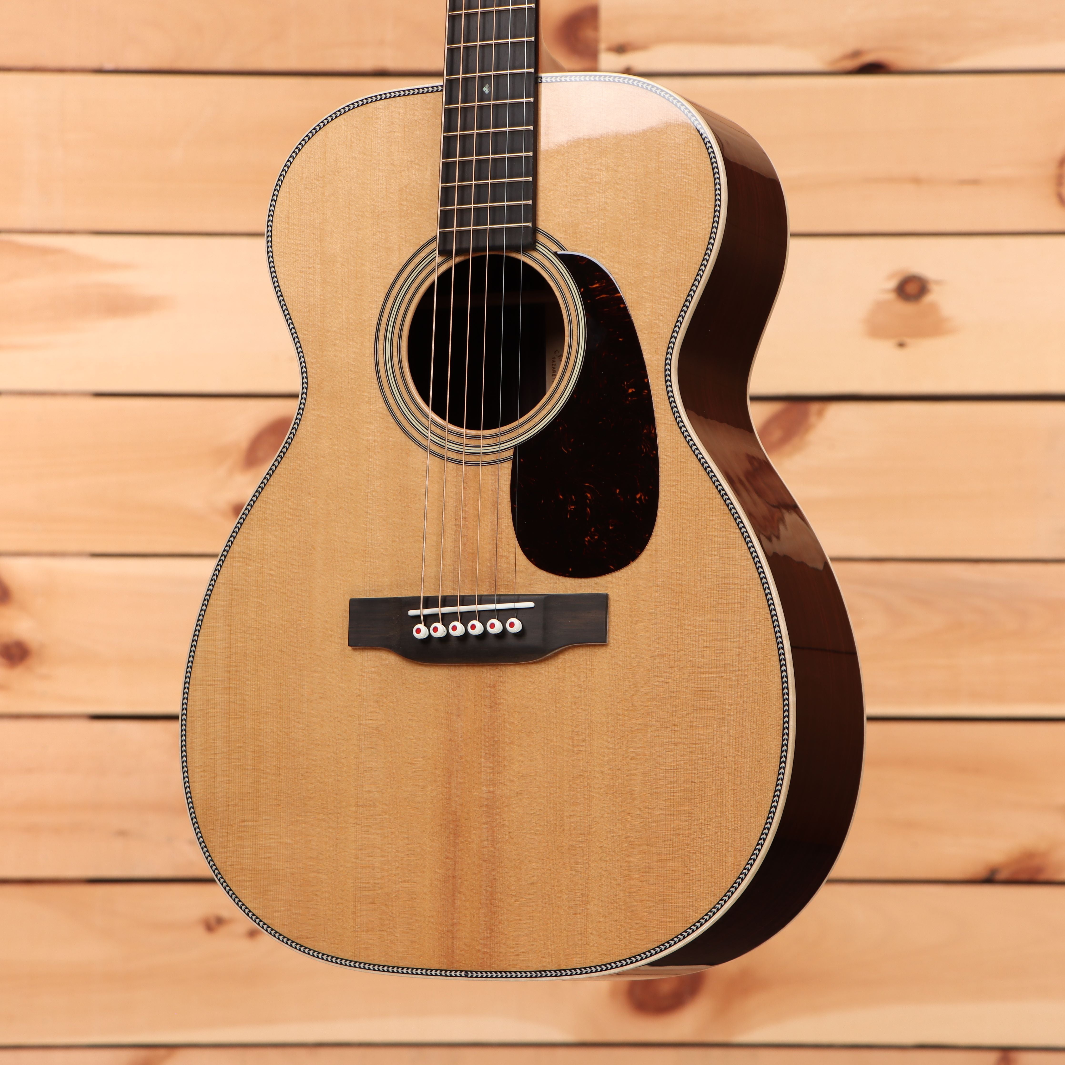 Martin 0028 Modern Deluxe dreadnought acoustic guitar natural finish with herringbone binding