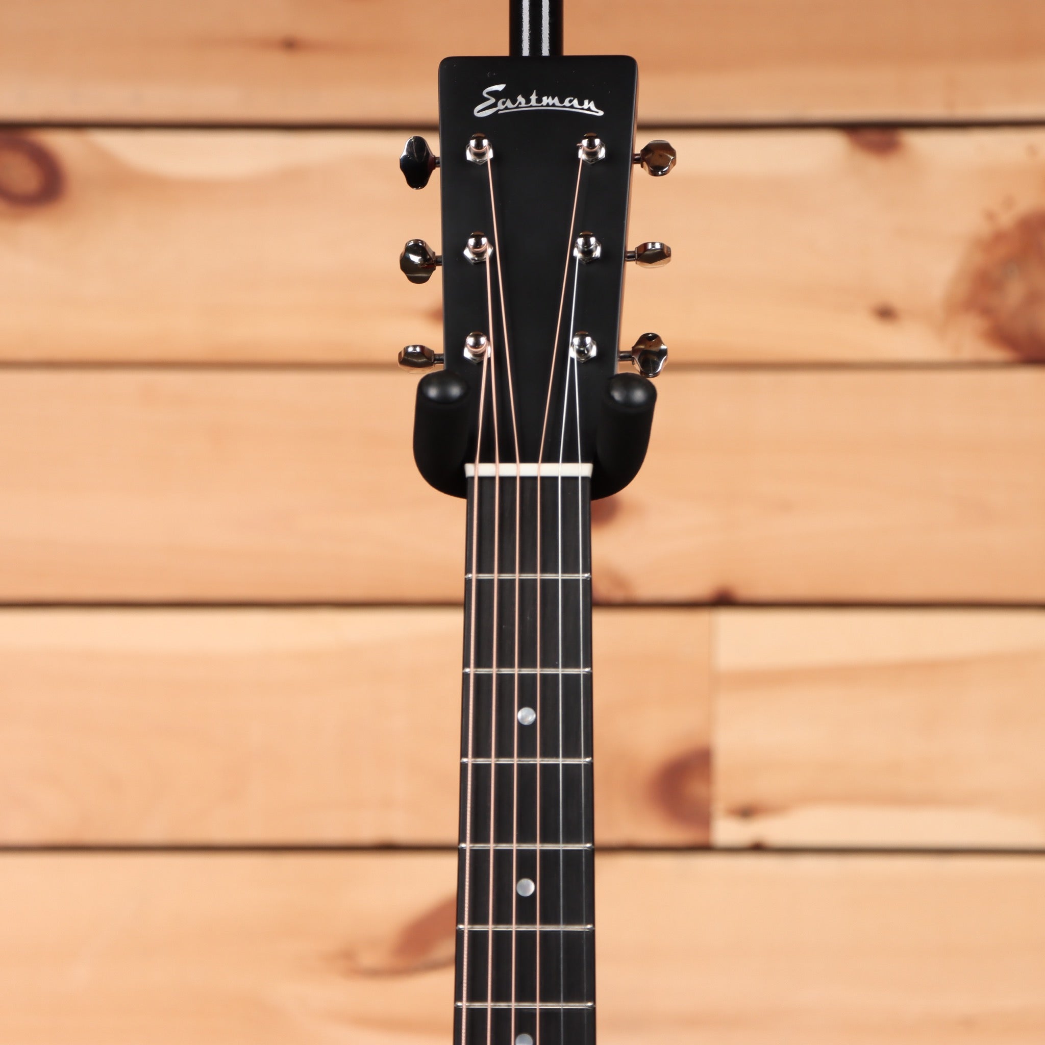 Eastman E10DTC dreadnought acoustic guitar natural finish with black headstock and rosewood fretboard