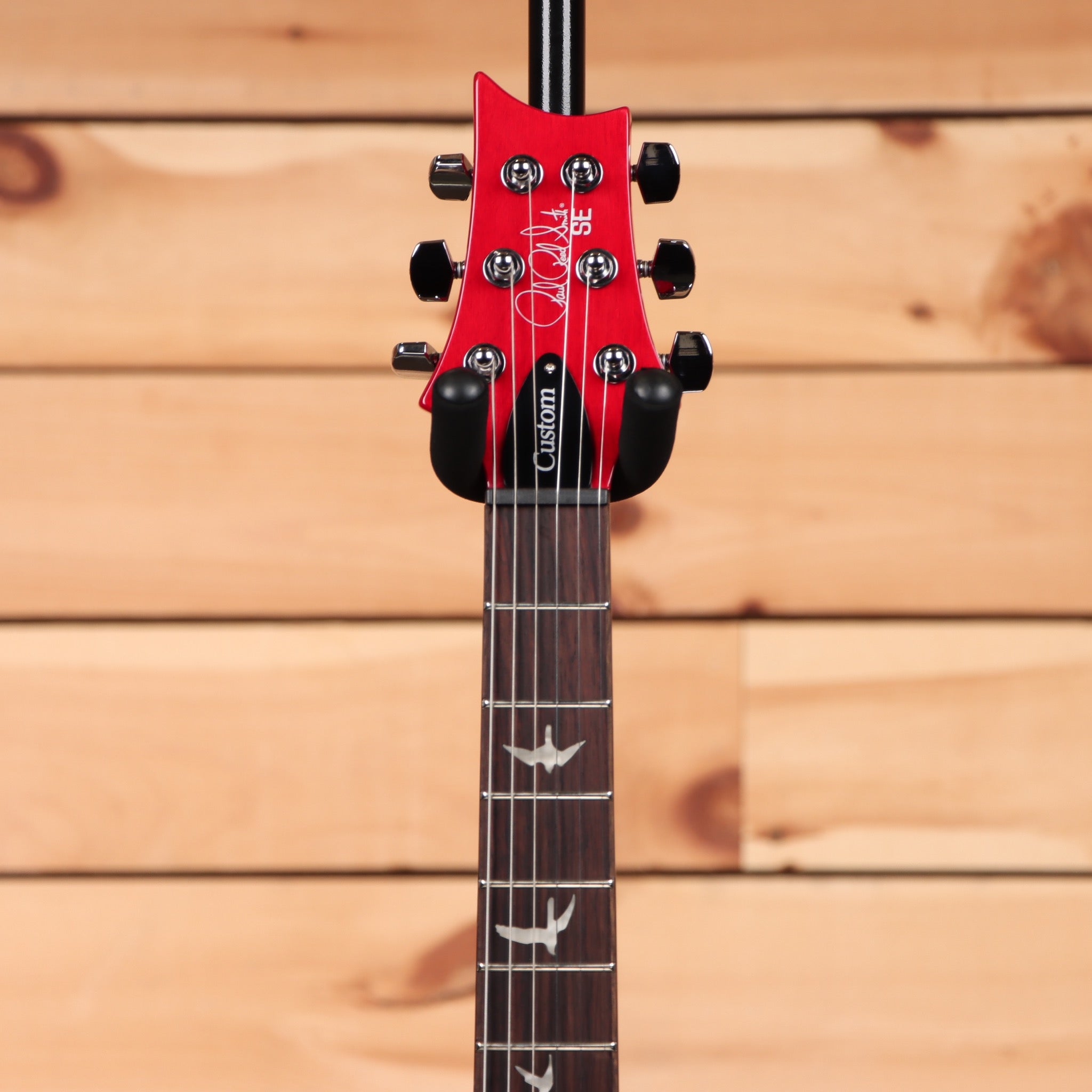 Paul Reed Smith SE Custom 24 electric guitar Ruby finish with bird inlays and dual humbuckers