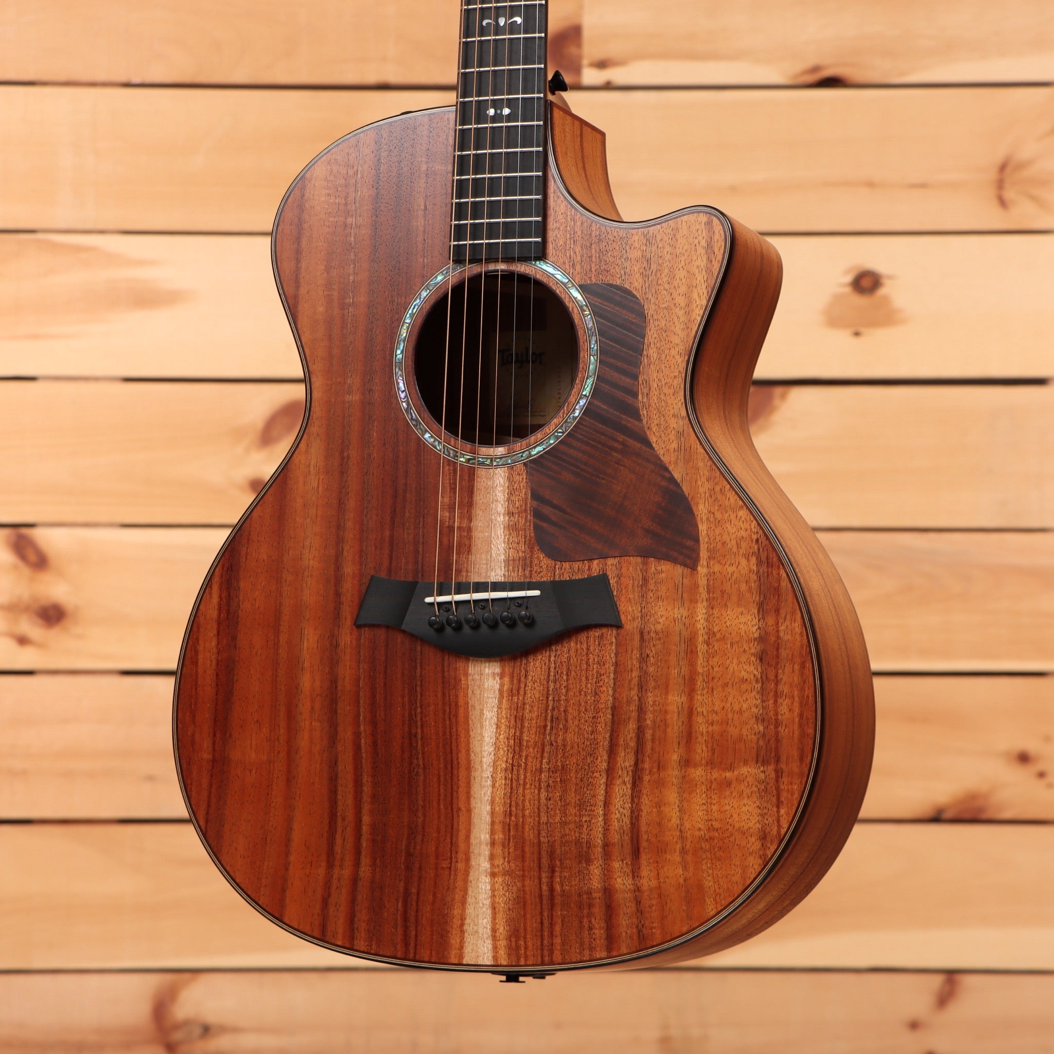 Taylor 724ce Grand Auditorium acoustic-electric guitar Natural with koa top and abalone rosette cutaway
