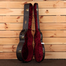 Taylor 724ce acoustic-electric guitar hardshell case black exterior with red velvet interior and gold hardware latches