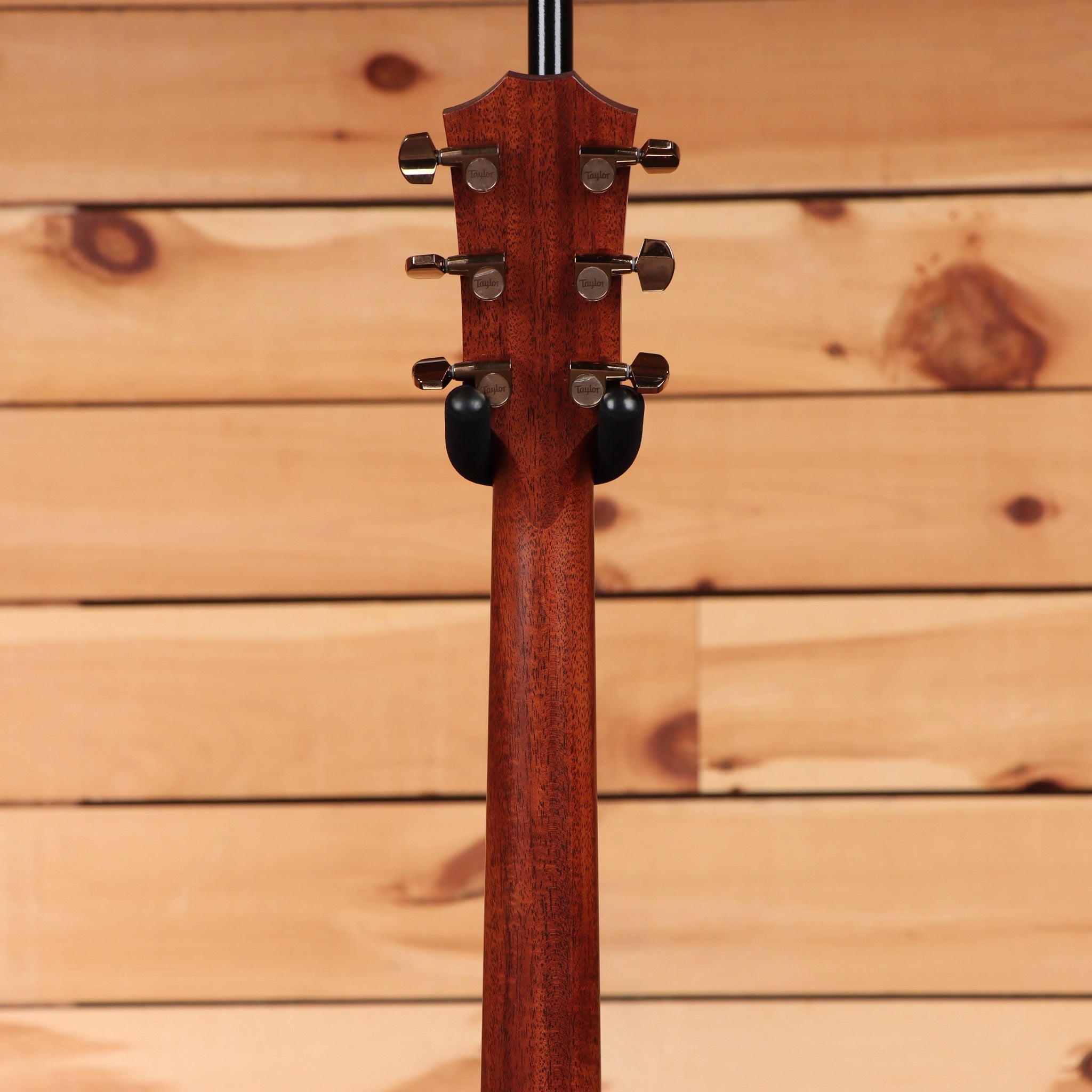 Taylor 724ce acoustic-electric guitar Natural with mahogany neck and bronze Taylor tuners rear headstock view