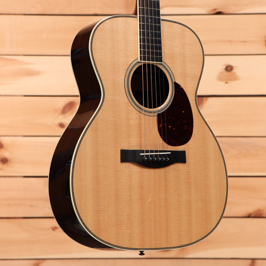 Santa Cruz OM natural pre-owned acoustic guitar with tortoiseshell pickguard and binding detail