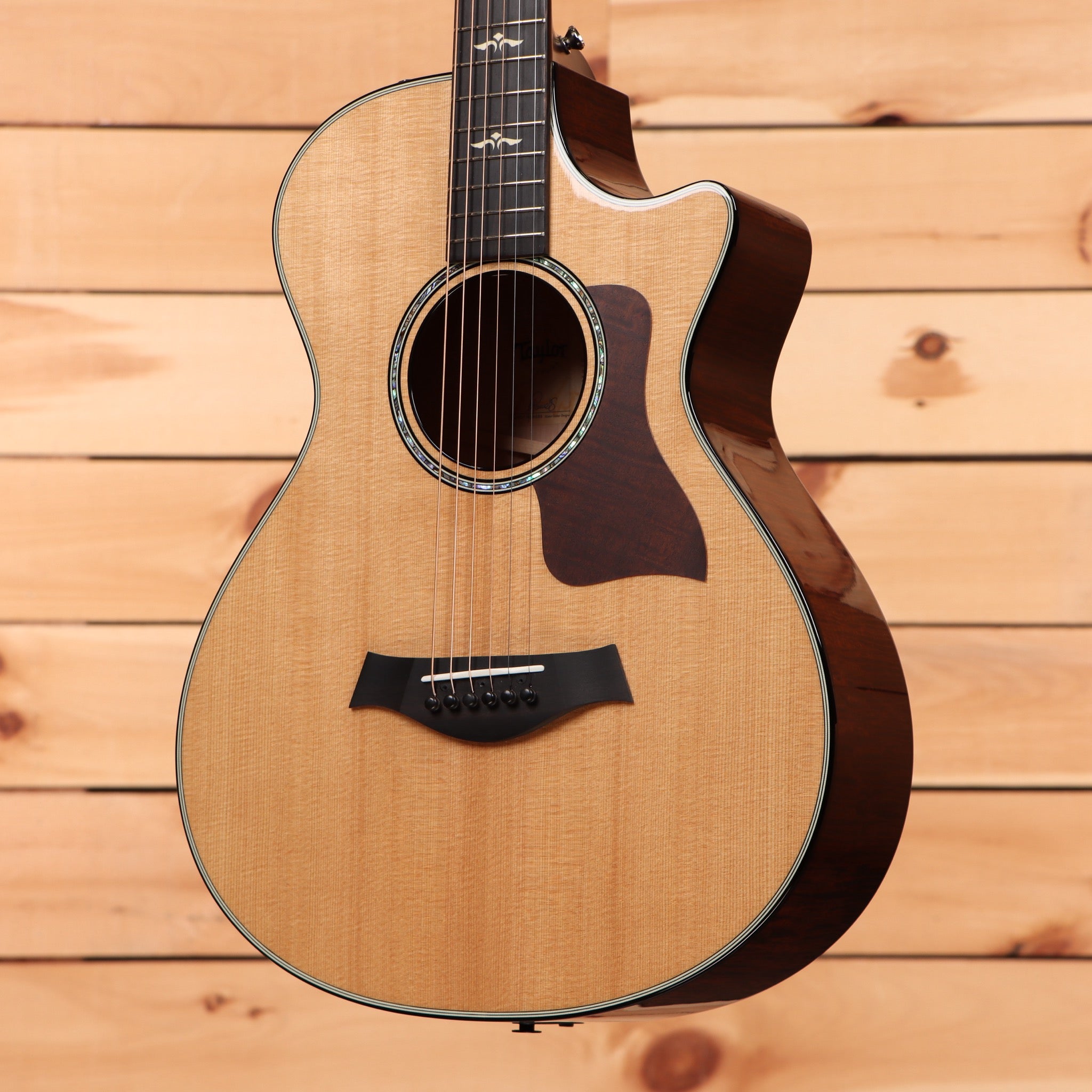 Taylor 612ce Grand Concert acoustic-electric guitar natural finish pre-owned with venetian cutaway