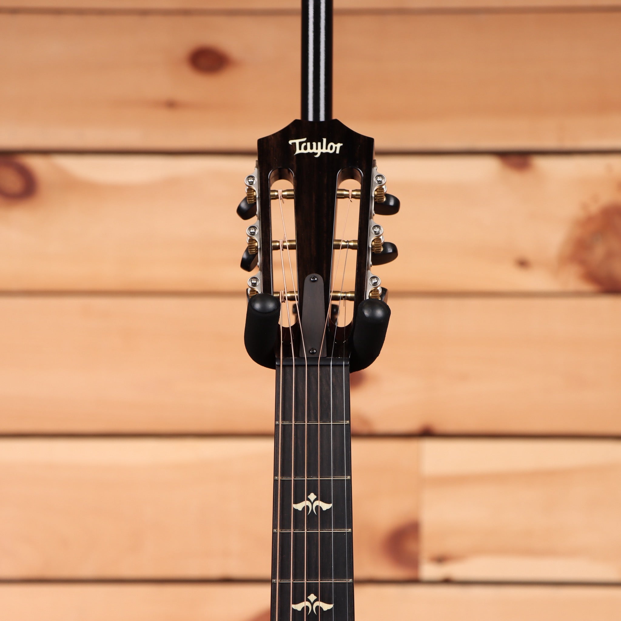 Taylor 612ce Grand Concert acoustic-electric guitar natural finish pre-owned with rosewood fretboard