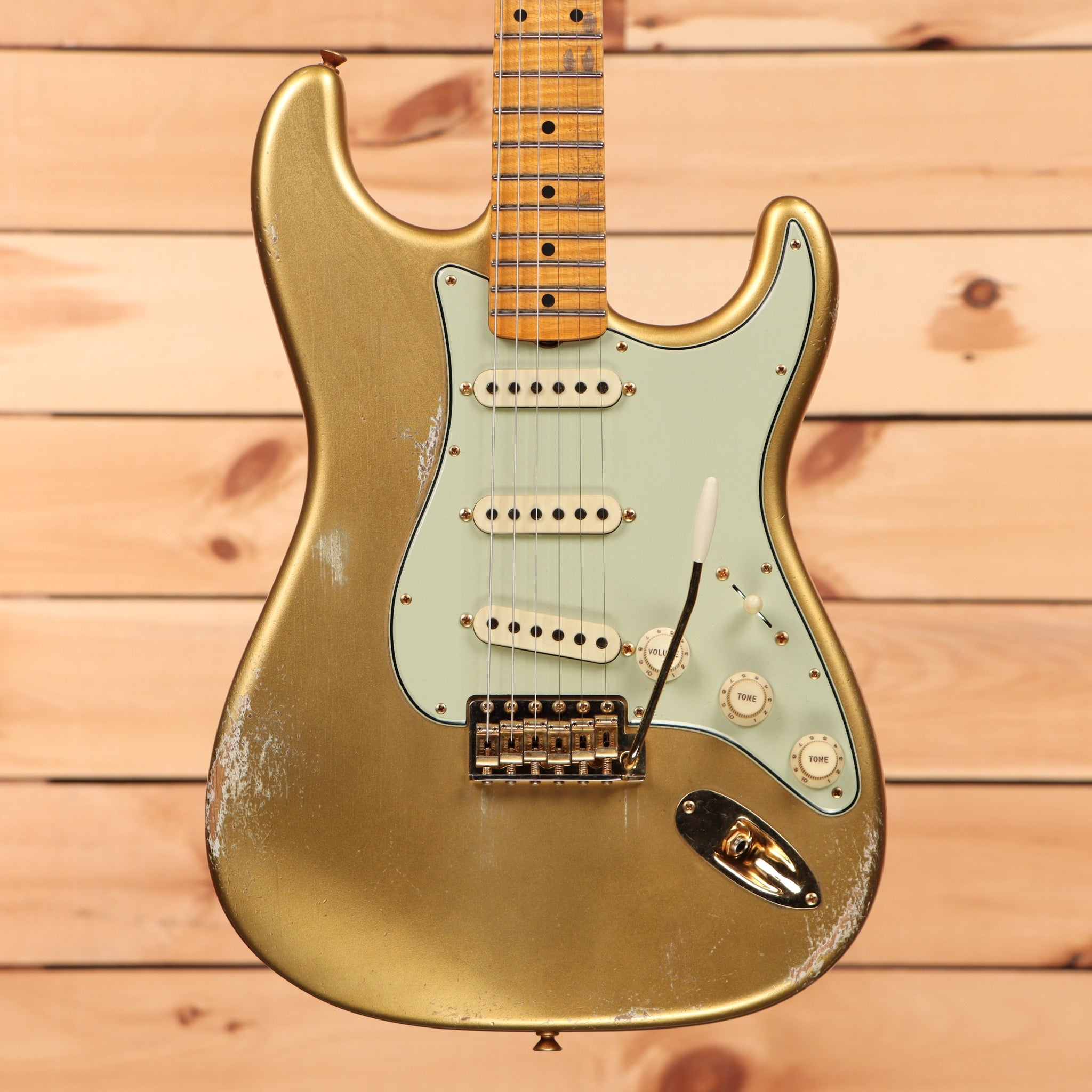 Fender Custom Shop Limited Andy Hicks Masterbuilt 1962 Poblano Stratocaster Aged Aztec Gold electric guitar with single-coil pickups and maple neck