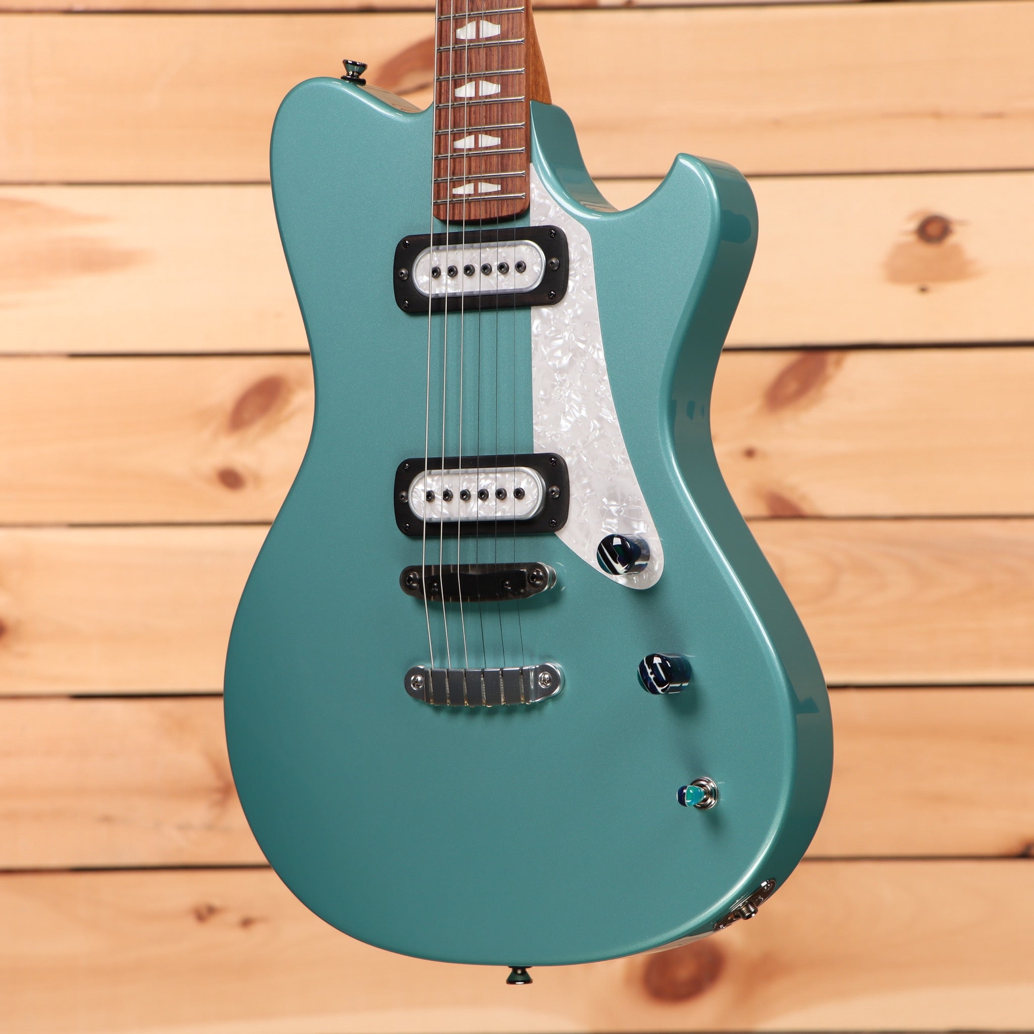Powers Electric A-Type HT Artesian Turquoise electric guitar with dual humbucker pickups and pearl pickguard