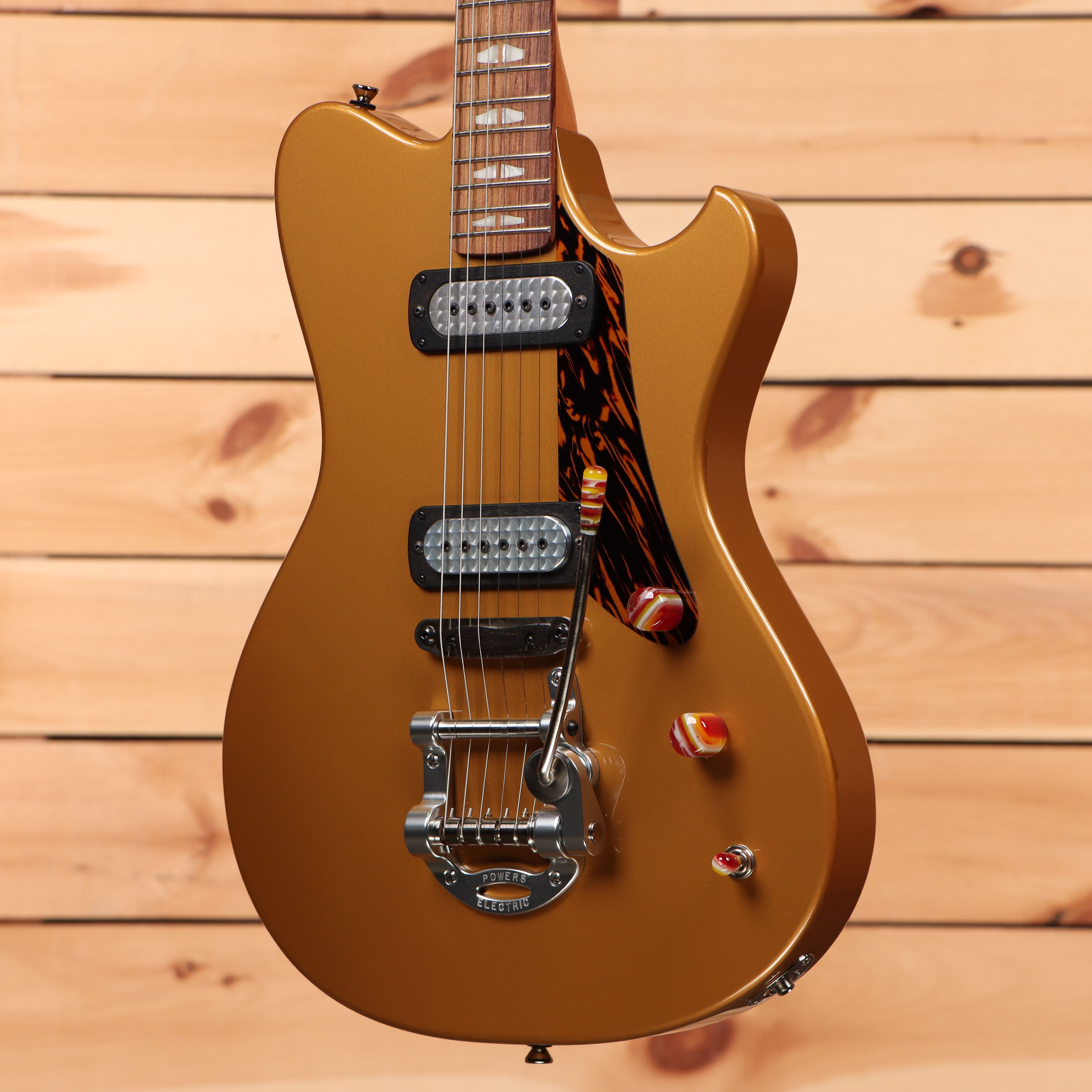 Powers Electric A-Type Golden Yellow Metallic electric guitar with dual humbucker pickups and vibrato bridge