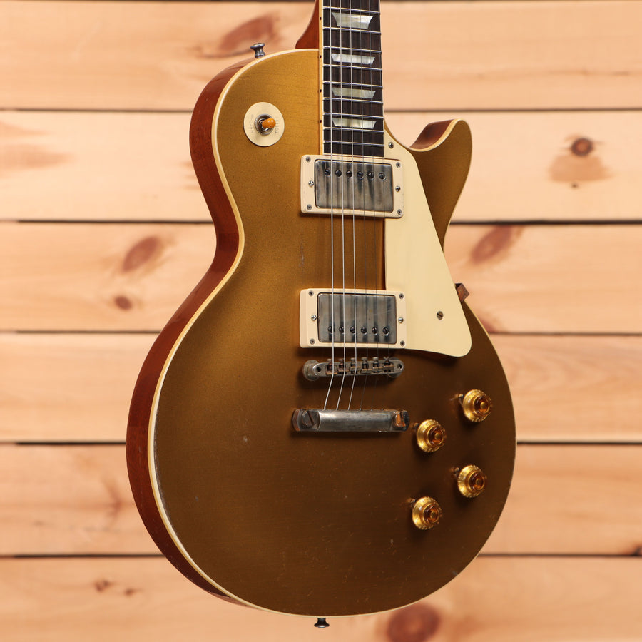 Gibson 1957 Les Paul Reissue Ultra Heavy Aged Double Gold electric guitar with gold hardware and dual humbuckers