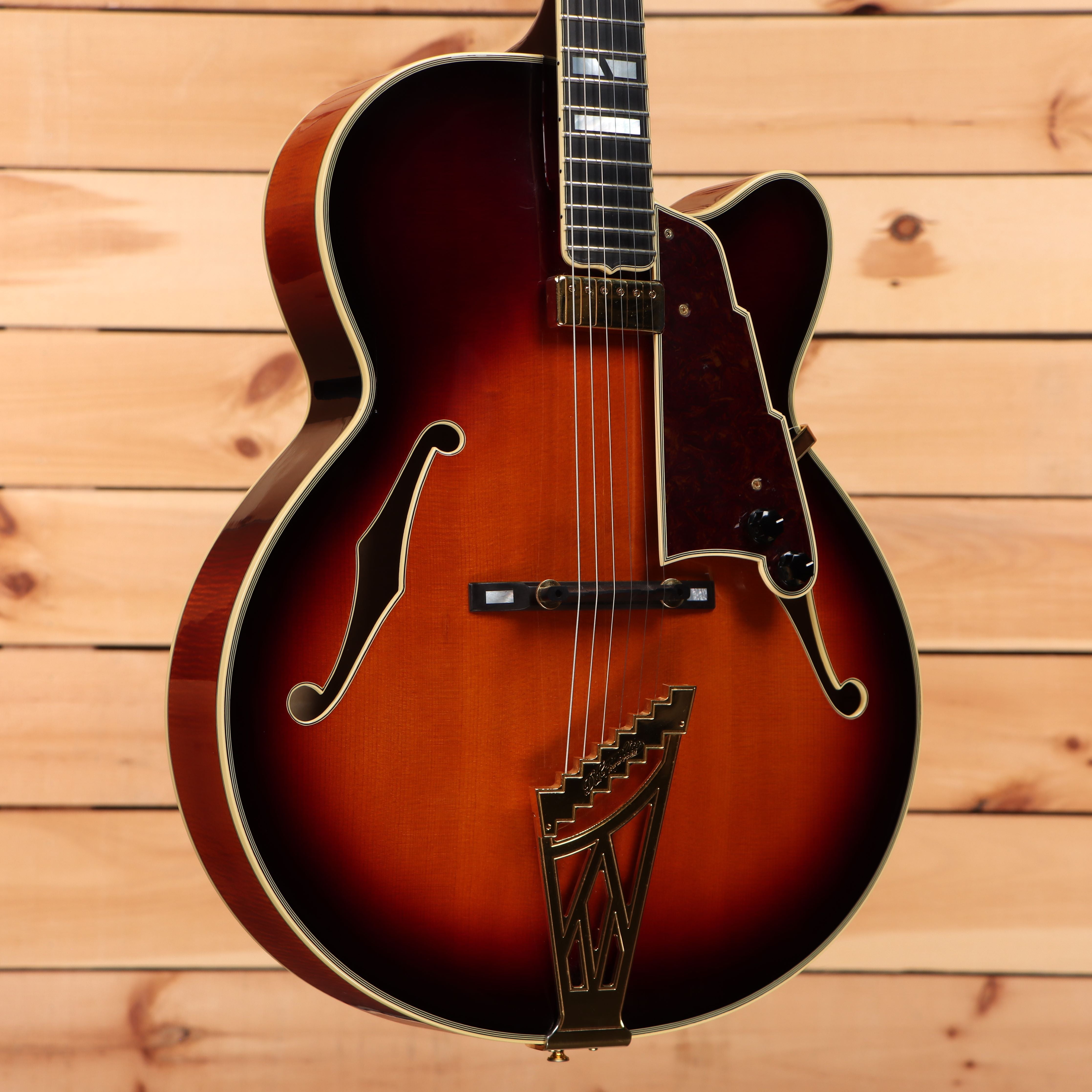 Pre-owned D'Angelico New Yorker semi-hollow electric guitar sunburst with f-holes and gold hardware