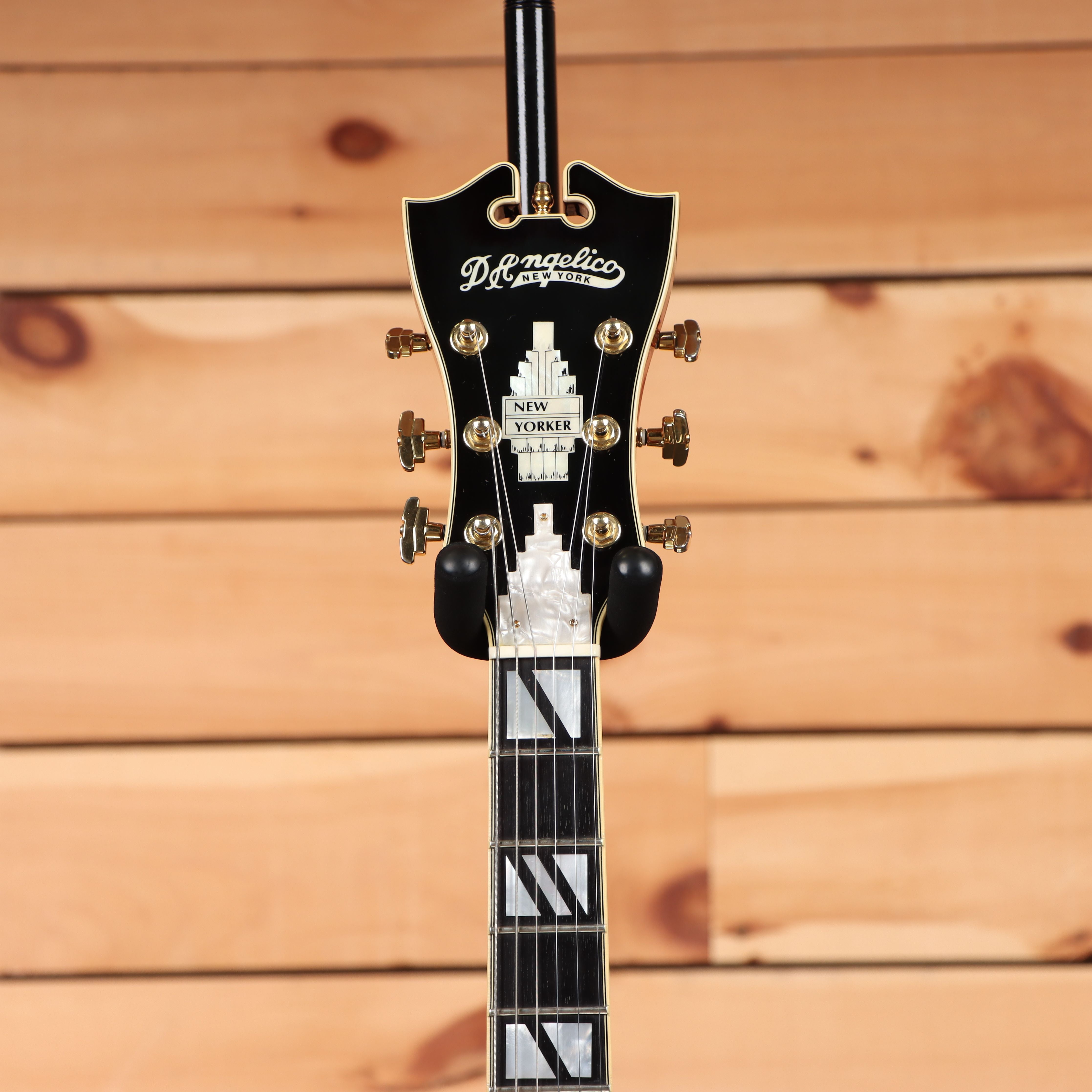 Pre-owned D'Angelico New Yorker semi-hollow electric guitar sunburst with gold hardware and block inlays