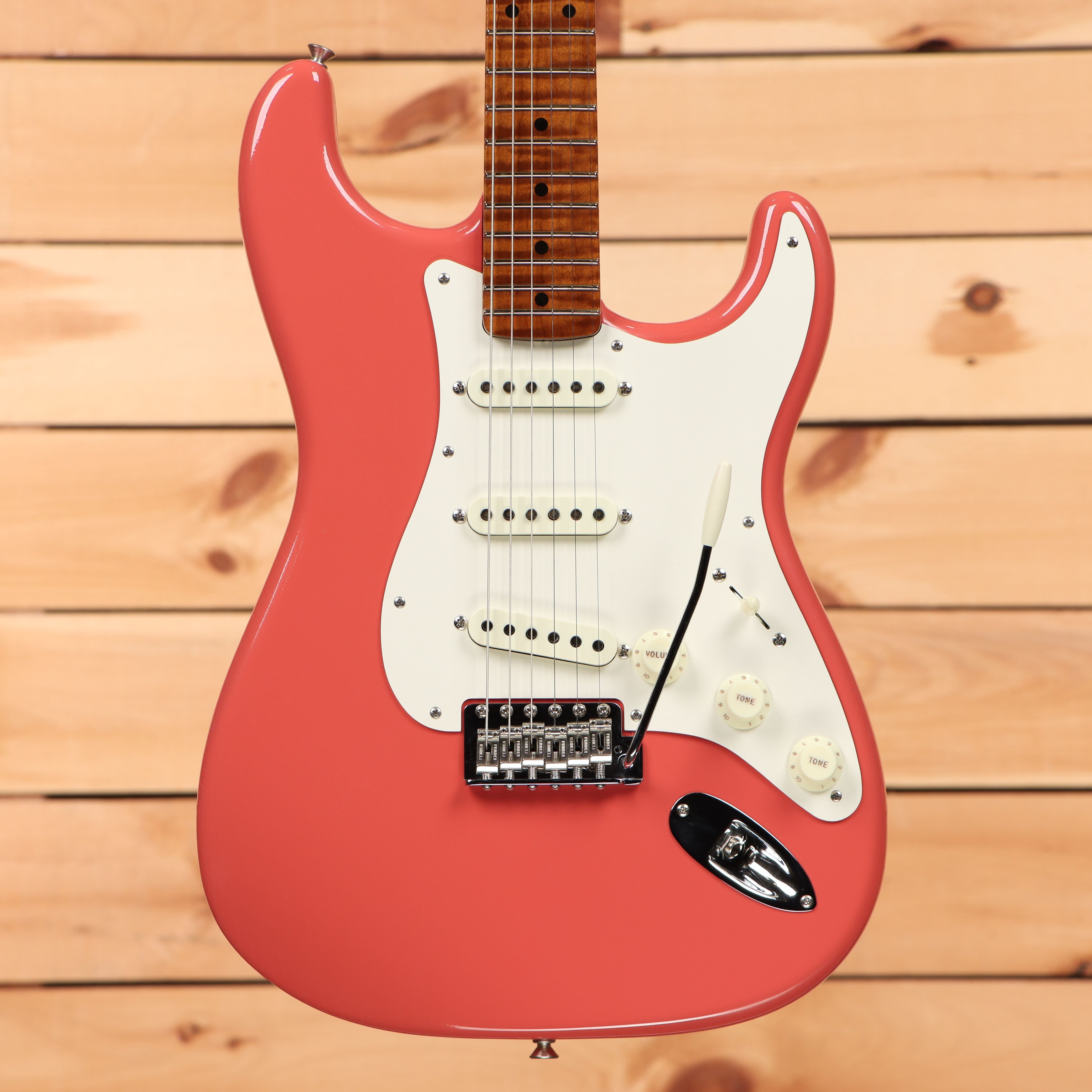 Fender Custom Shop Limited Roasted 1950s Stratocaster electric guitar Tahitian Coral with white pickguard and single-coil pickups