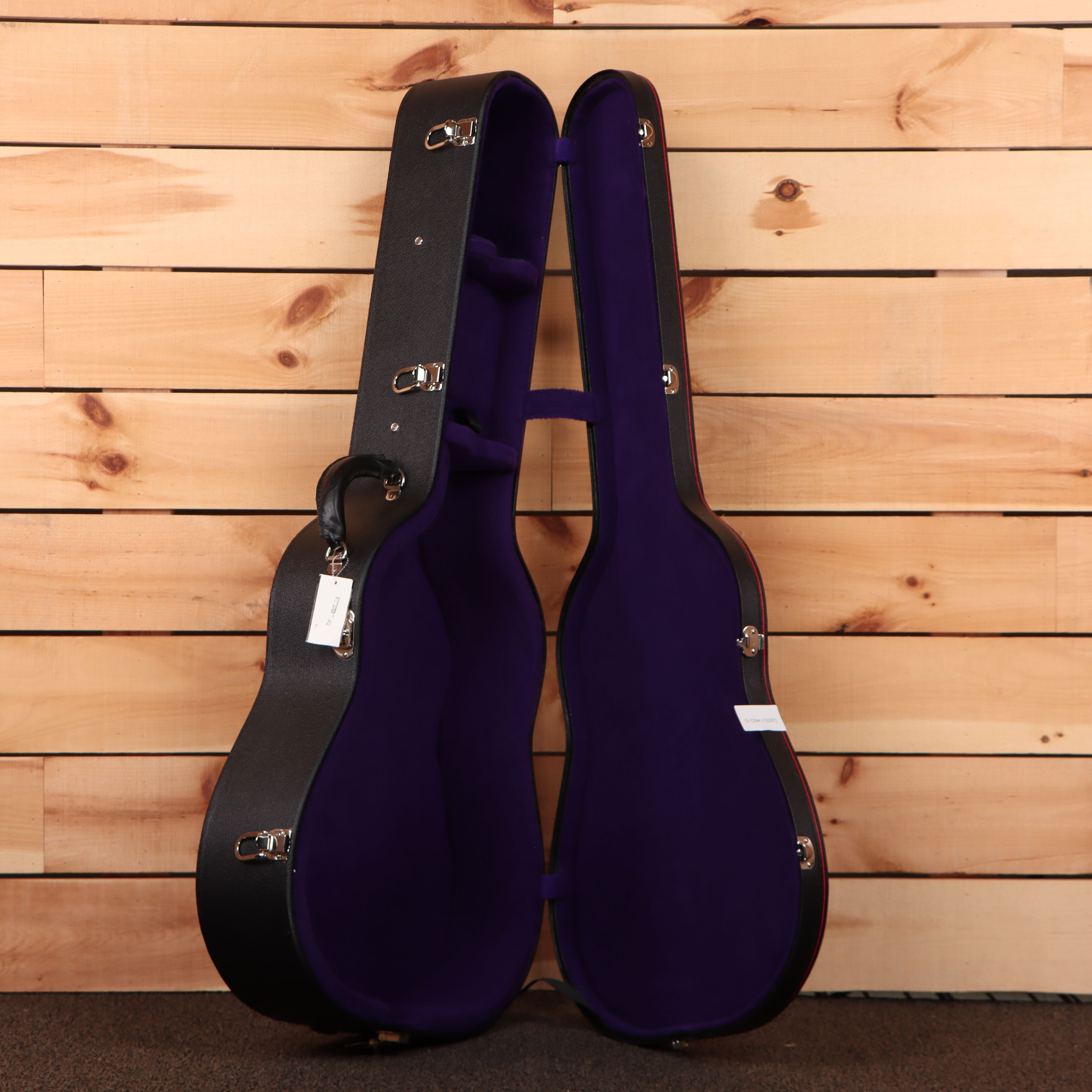 Gibson J-45 acoustic guitar light aged vintage sunburst with purple velvet-lined hard case
