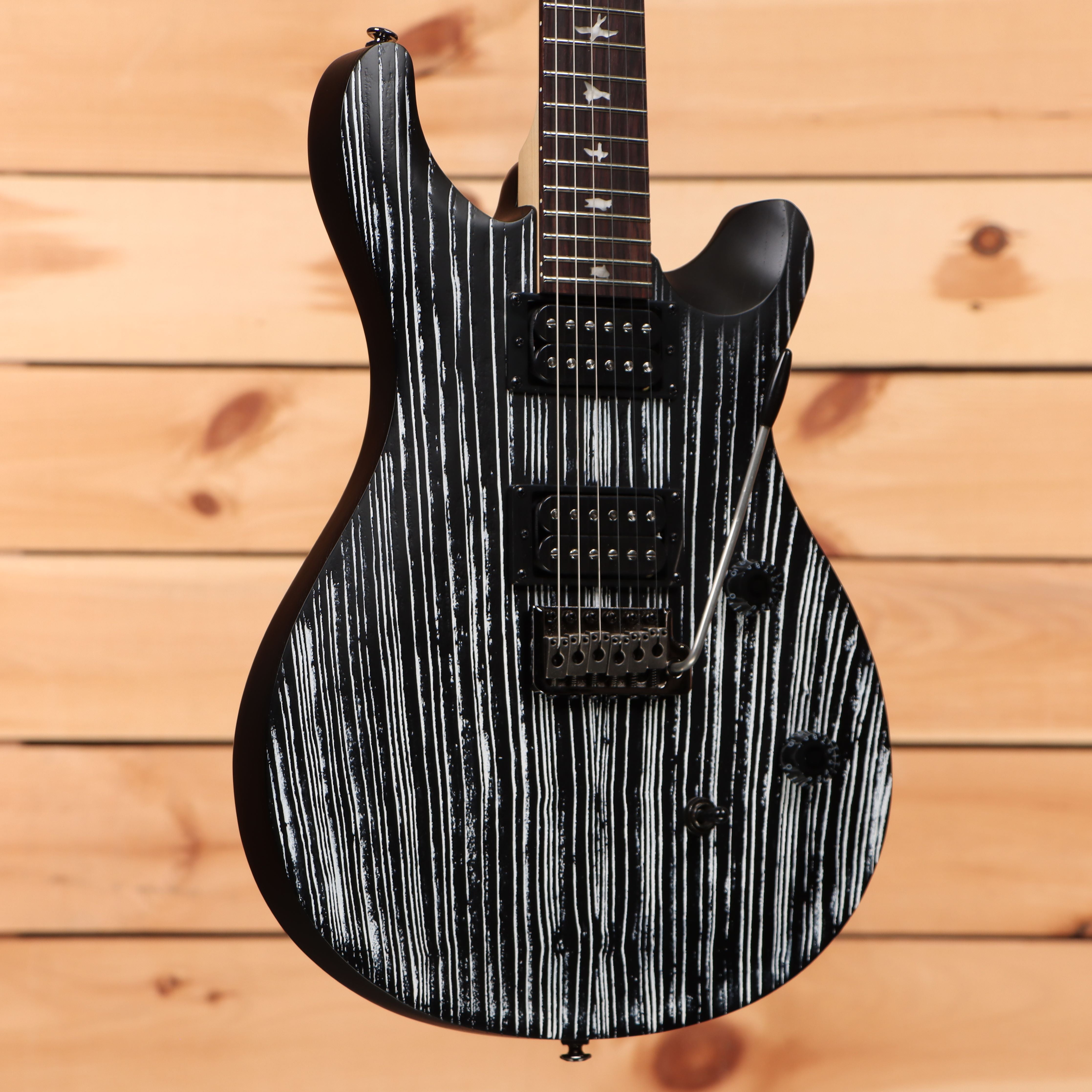 Paul Reed Smith Limited SE CE 24 Sandblasted White electric guitar with dual humbuckers and figured maple top