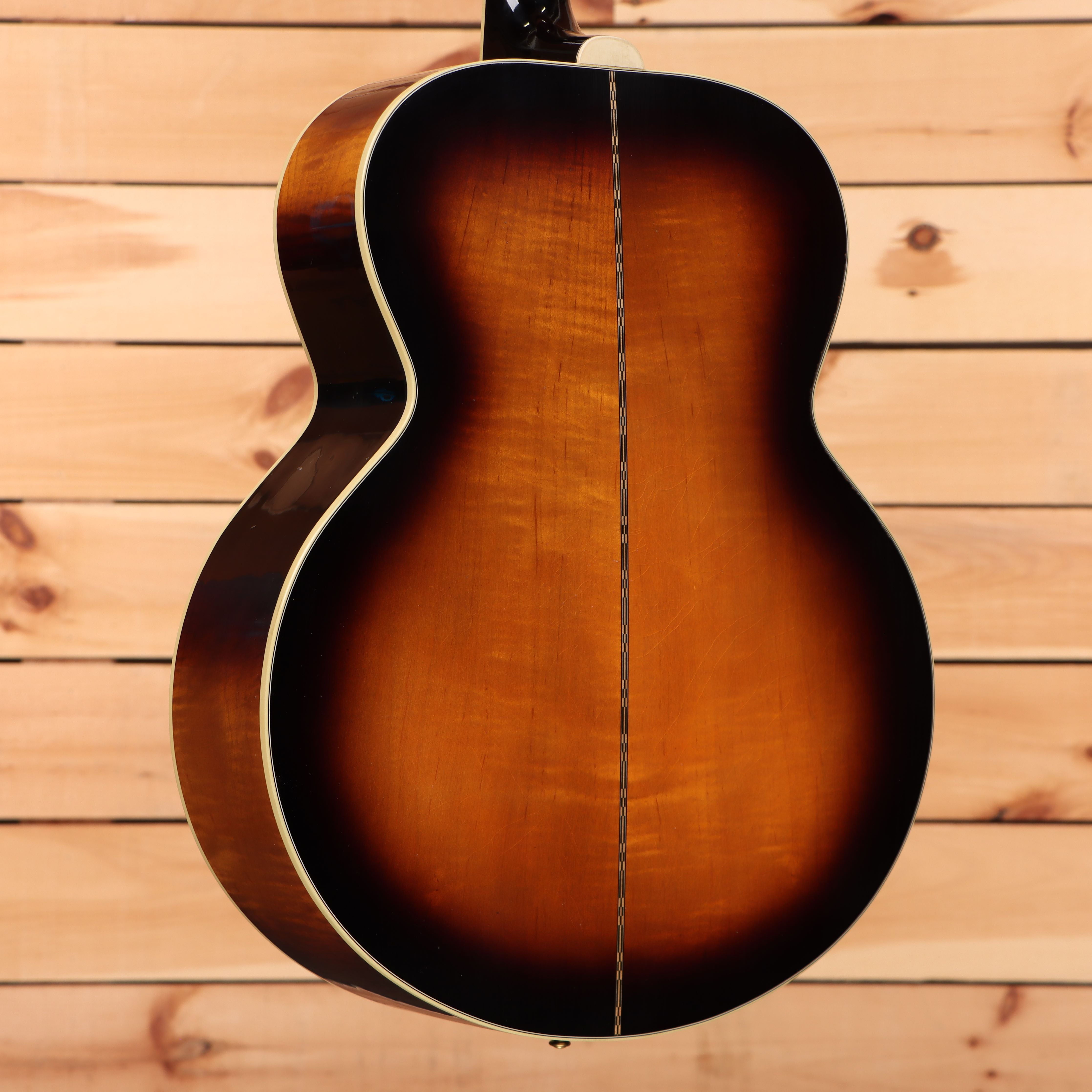 Gibson 1957 SJ200 acoustic guitar light aged vintage sunburst jumbo body with white binding