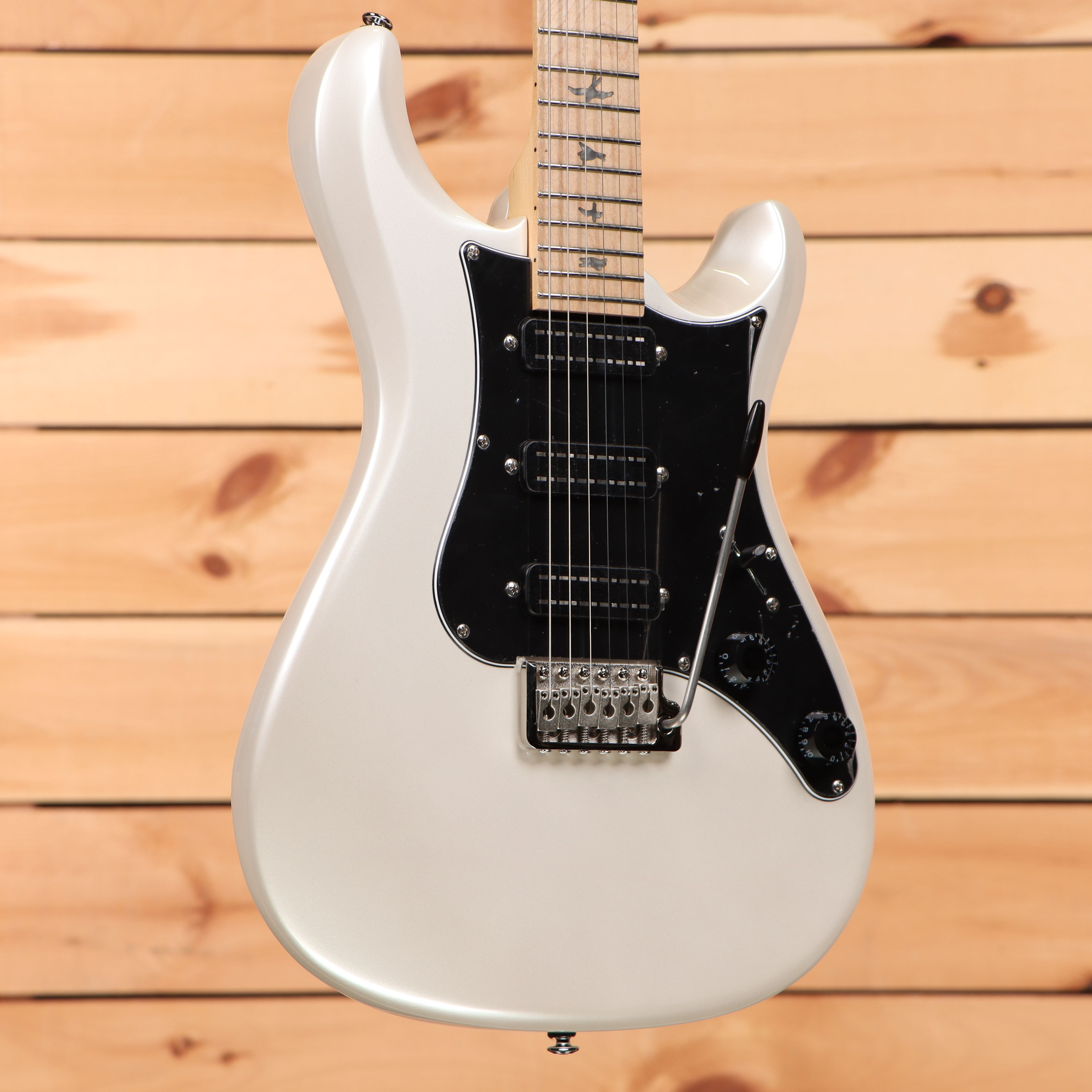 Paul Reed Smith SE NF3 electric guitar Maple White Pearl with black pickguard and humbucker pickups
