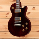 Pre-owned Gibson Les Paul Studio 100th Anniversary wine red electric guitar with dual humbuckers and gold hardware