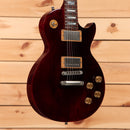 Pre-owned Gibson Les Paul Studio 100th Anniversary electric guitar Wine Red with dual humbucker pickups and gold hardware