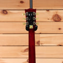 Pre-owned Gibson Les Paul Studio 100th Anniversary electric guitar wine red with dual humbucker pickups