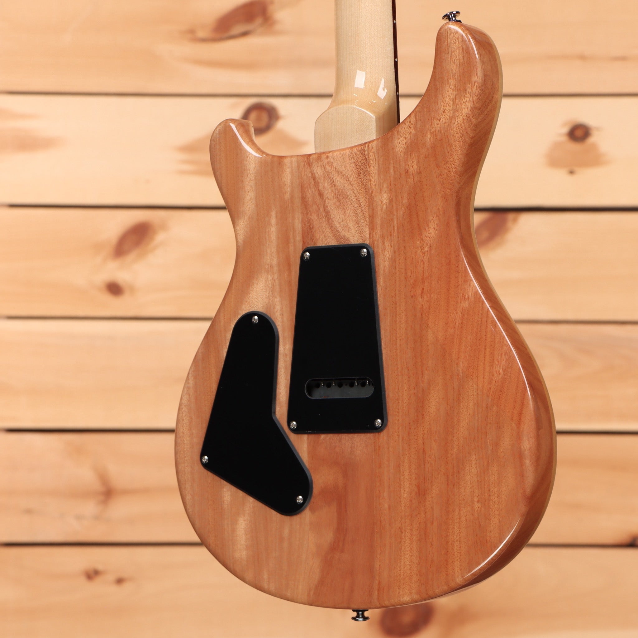 Paul Reed Smith SE Custom electric guitar natural finish with black pickguard and humbucker pickups