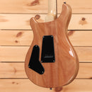 Paul Reed Smith SE Custom electric guitar blood orange finish with black pickguard and single-coil pickup configuration