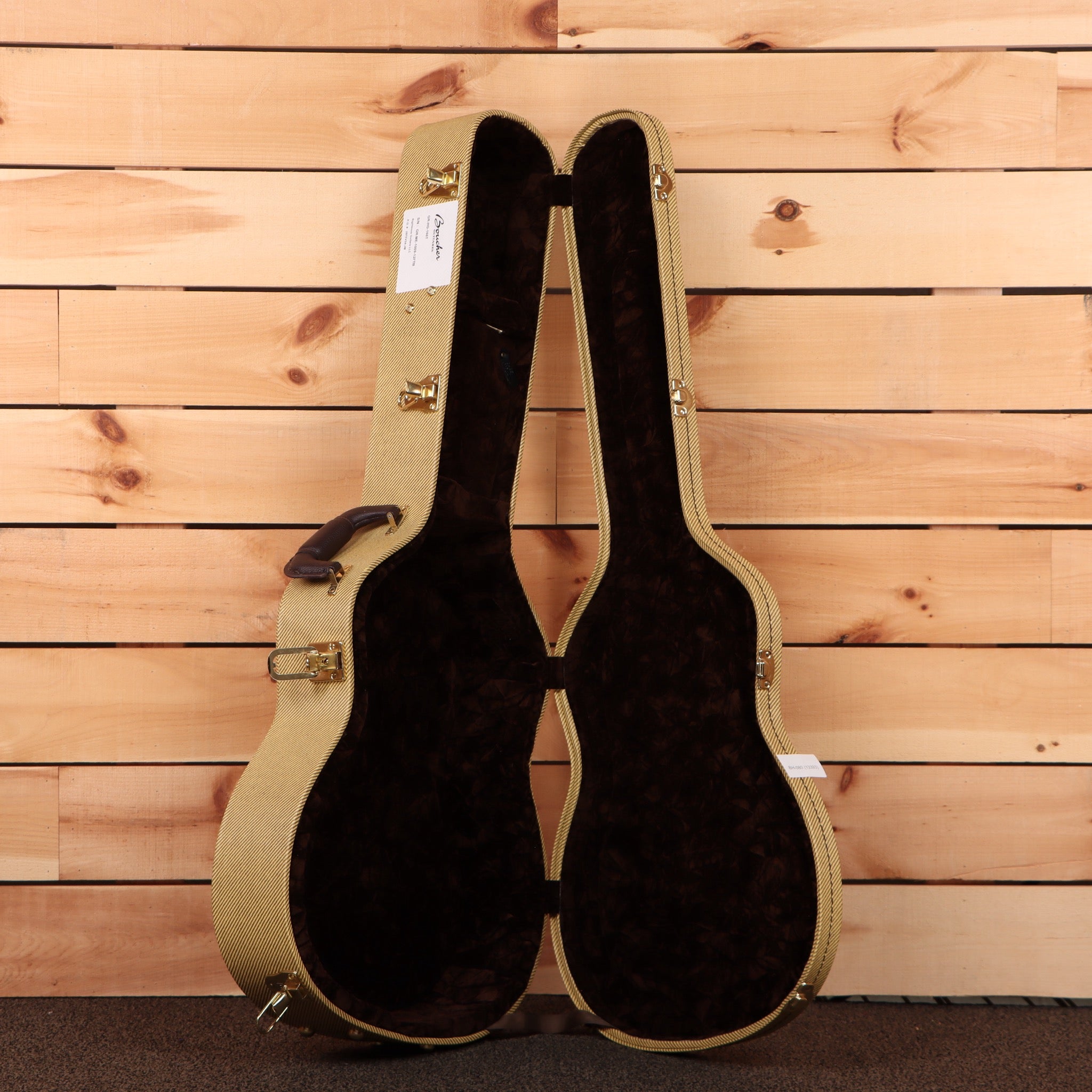 Boucher GRHG166T natural grand concert classical guitar case open showing black velvet interior with gold hardware