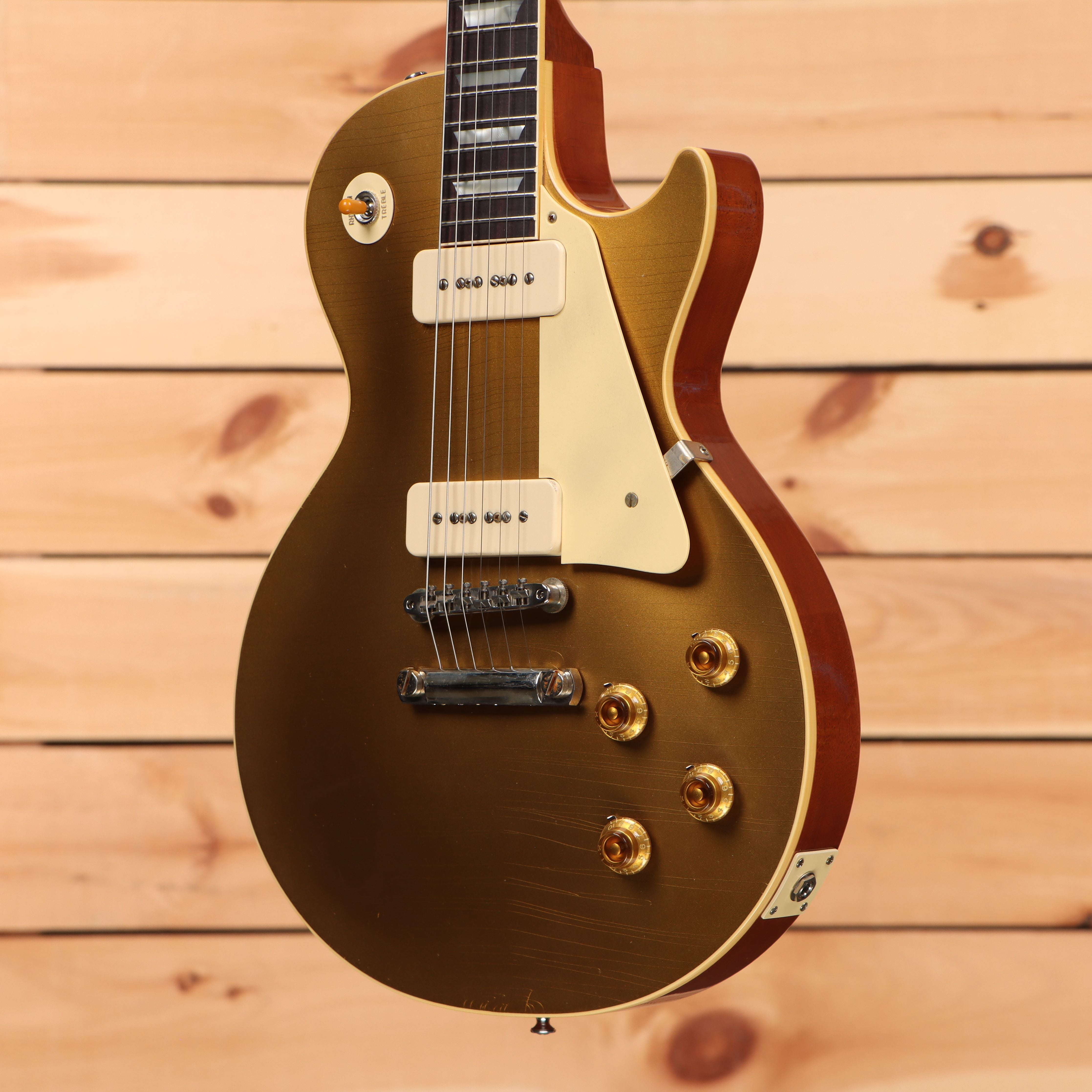 Gibson 1956 Les Paul Reissue Ultra Light Aged Double Gold electric guitar with gold hardware and dual humbuckers