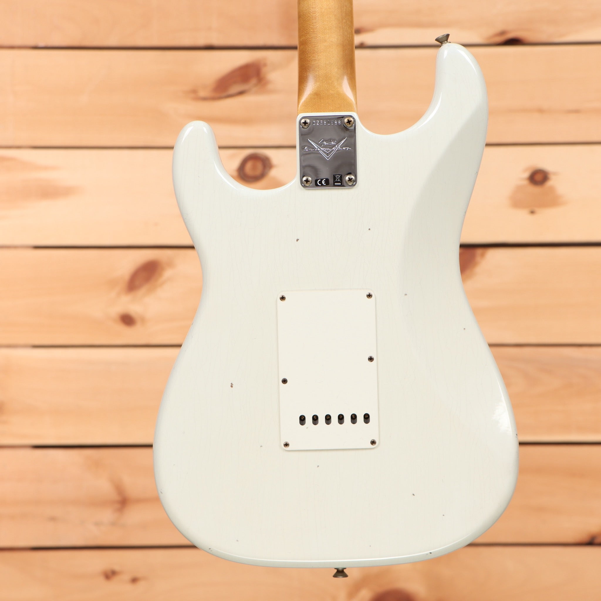Fender Custom Shop 1964 Stratocaster Journeyman Relic electric guitar Olympic White with single-coil pickups