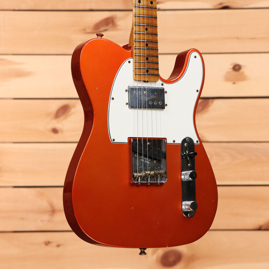 Fender Postmodern Telecaster Journeyman Relic electric guitar Candy Tangerine with maple neck and single-coil pickups