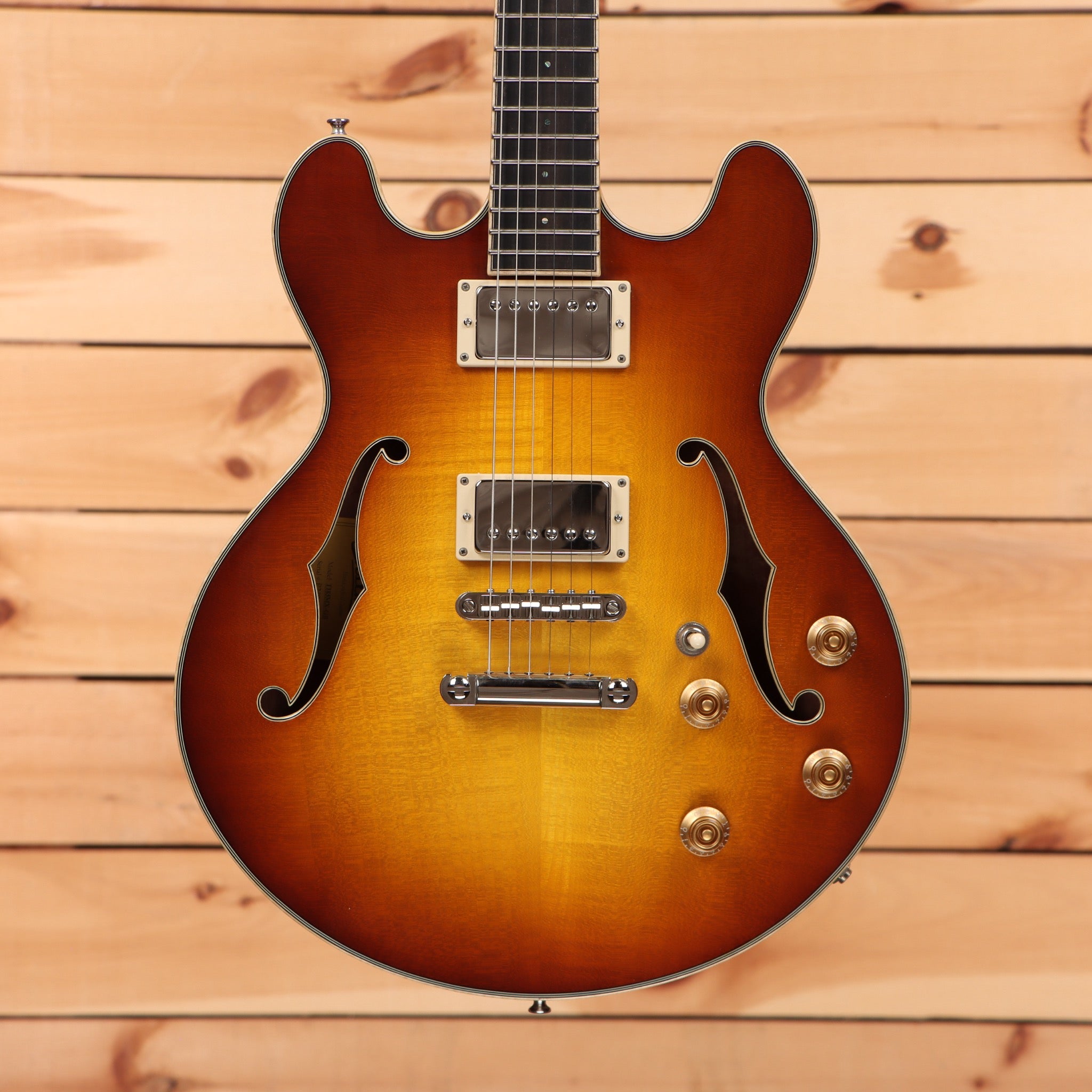 Eastman T185MX semi-hollow body electric guitar goldburst finish with dual humbucker pickups and f-holes