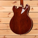 Eastman T185MX semi-hollowbody electric guitar Goldburst with cream binding and f-hole