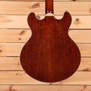 Eastman T185MX semi-hollow electric guitar goldburst finish with cream binding and f-holes