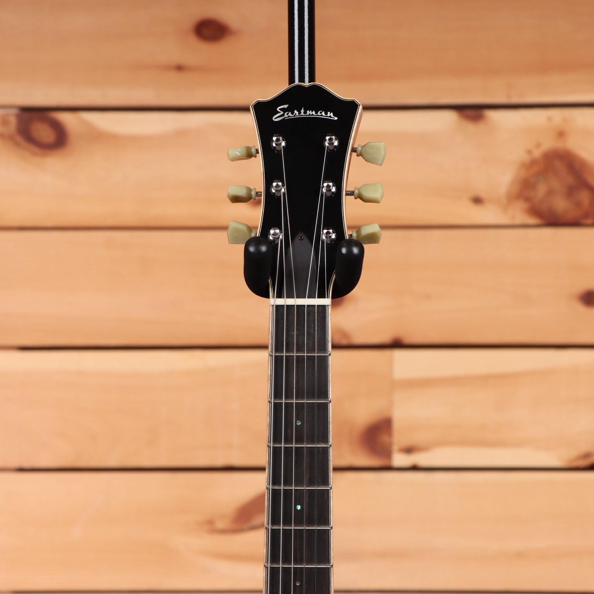 Eastman T185MX semi-hollow electric guitar Goldburst with cream tuning pegs and maple neck