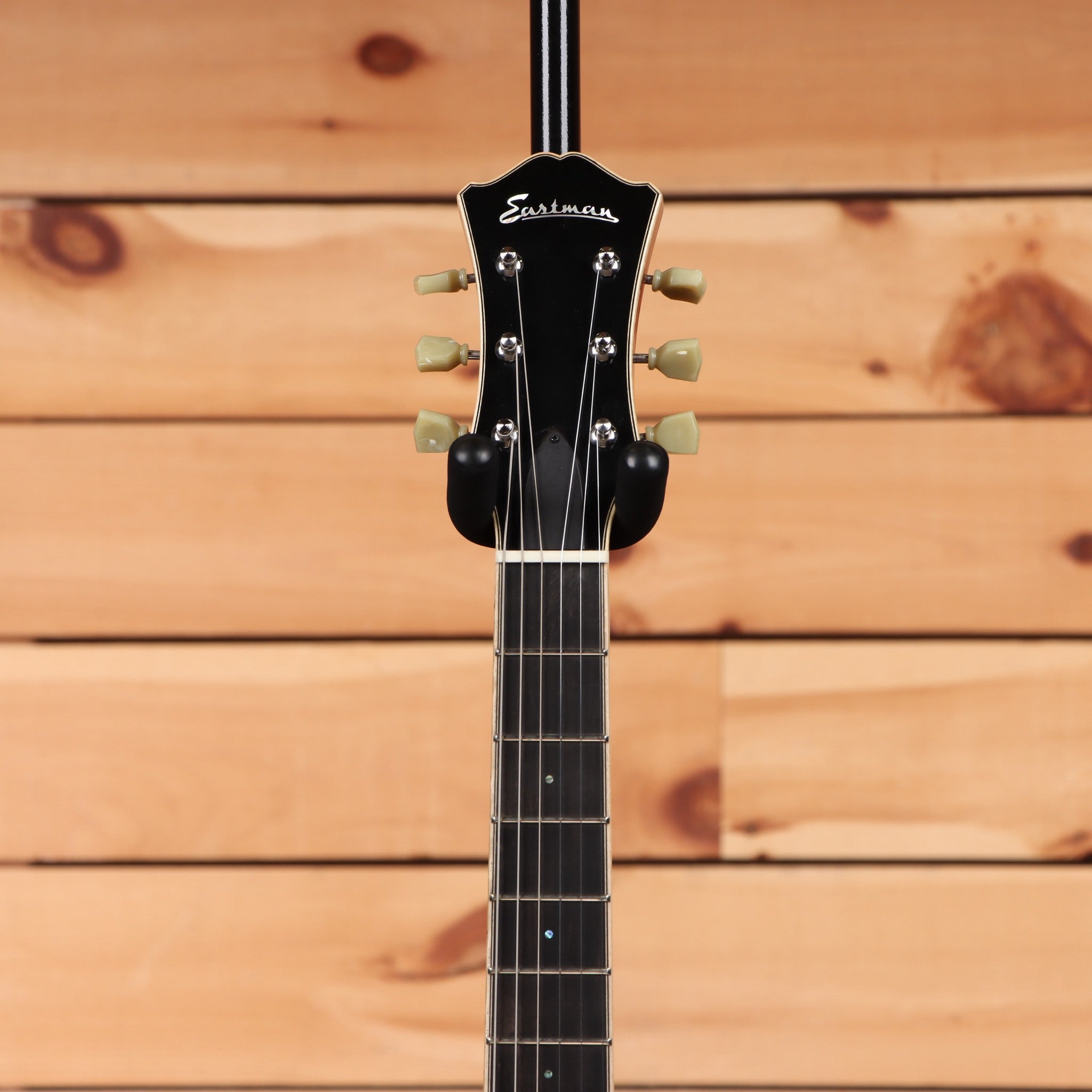 Eastman T185MX semi-hollow body electric guitar goldburst with cream tuning machines and maple neck