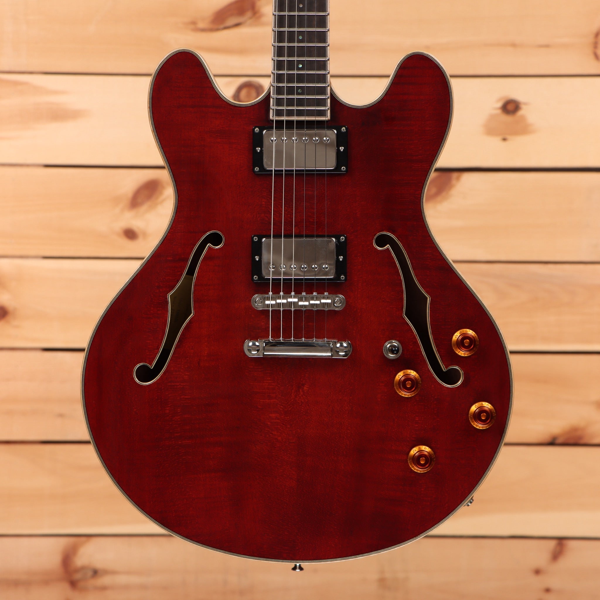Eastman T186mx semi-hollow body electric guitar classic red with dual humbucker pickups and f-holes