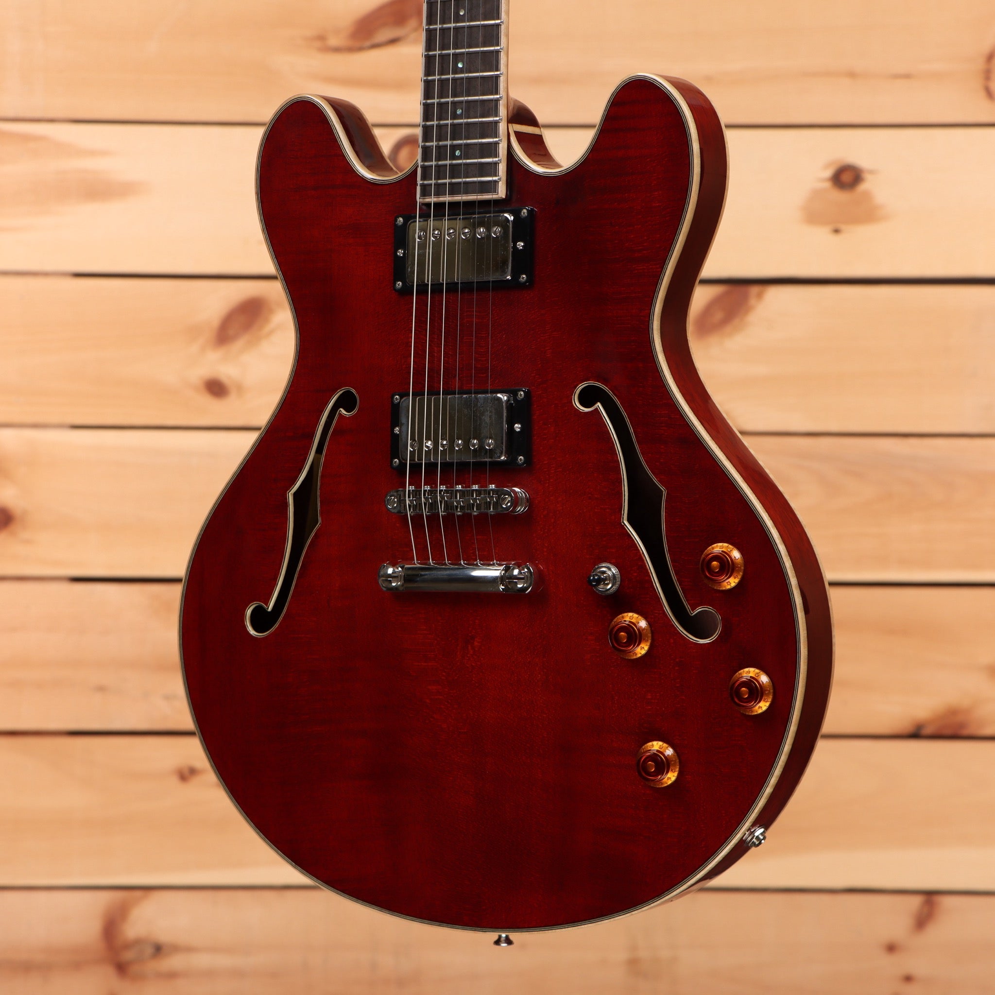 Eastman T186MX semi-hollow body electric guitar classic red finish with gold hardware and f-holes
