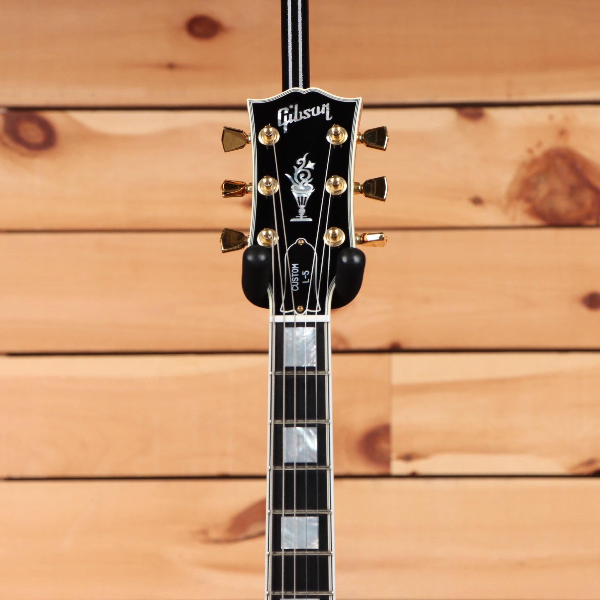 Pre-owned Gibson L5 double-cutaway semi-hollow electric guitar Iced Tea with gold hardware and rosewood fretboard