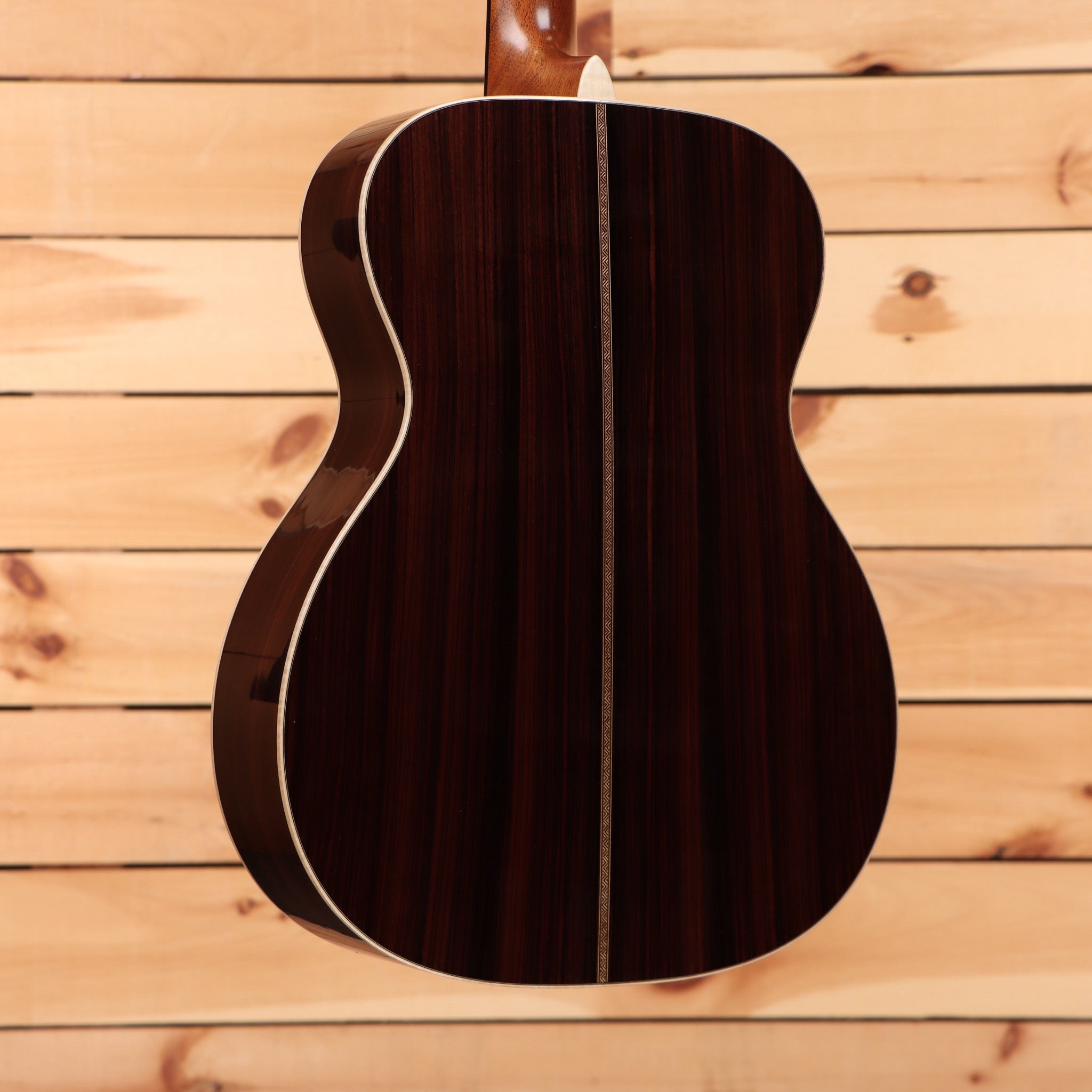 Martin OM28 Modern Deluxe acoustic guitar natural finish with white binding and rosewood back