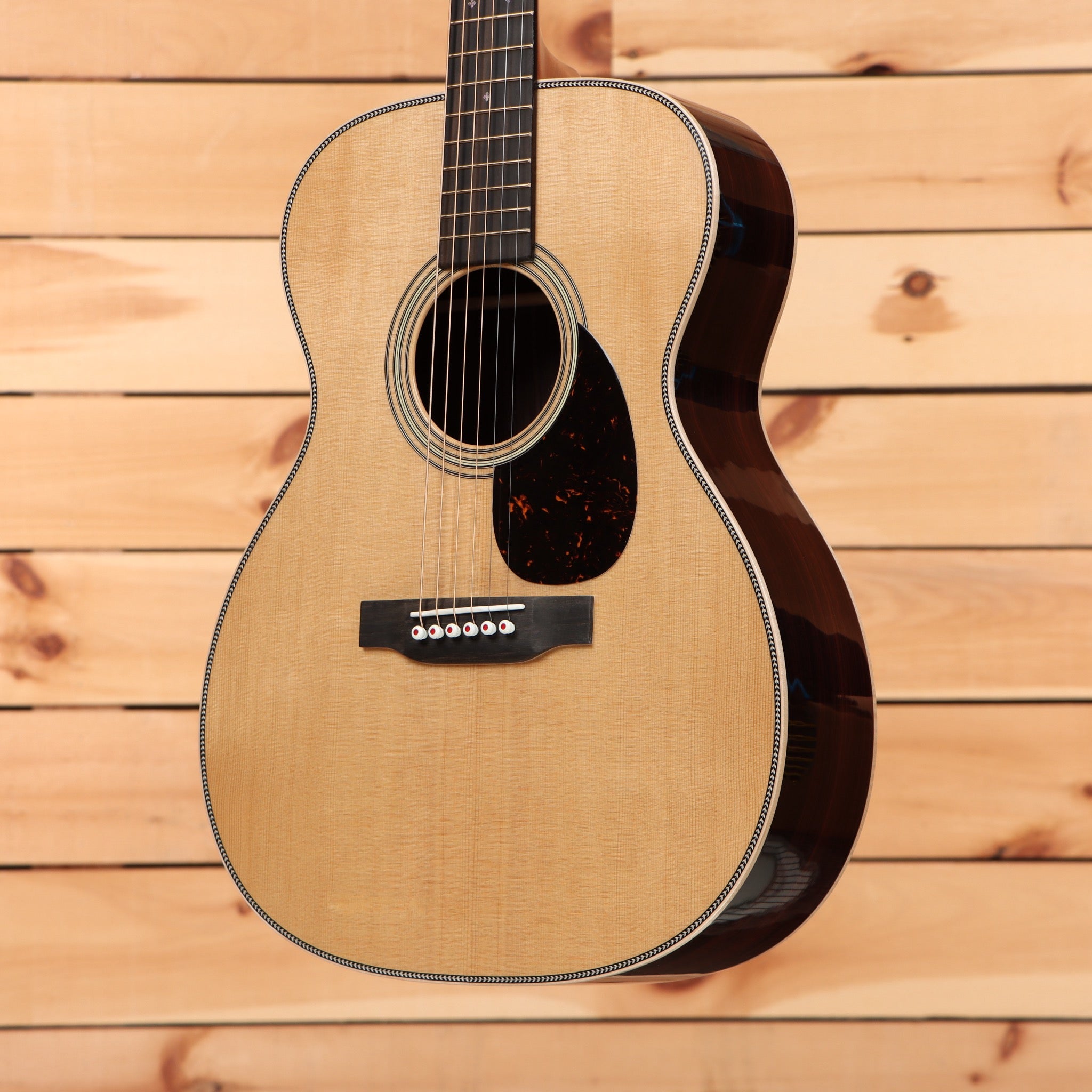 Martin OM28 Modern Deluxe acoustic guitar natural finish with tortoiseshell pickguard