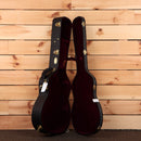 Martin OM28 Modern Deluxe acoustic guitar natural finish with burgundy velvet-lined hard case