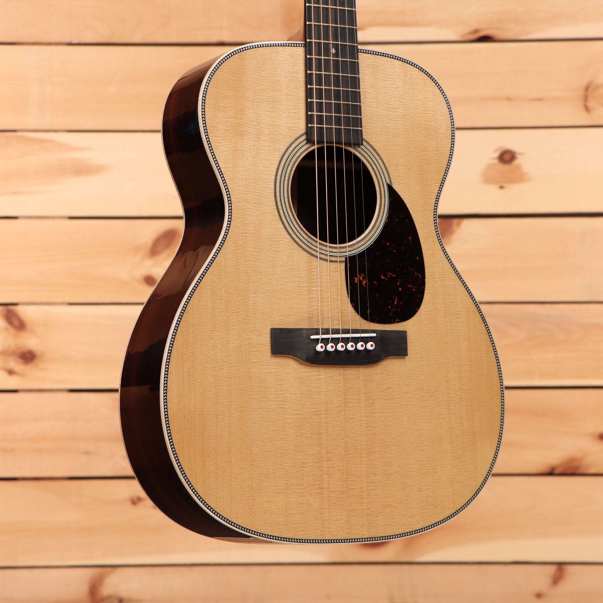 Martin OM28 Modern Deluxe acoustic guitar natural finish with tortoiseshell pickguard