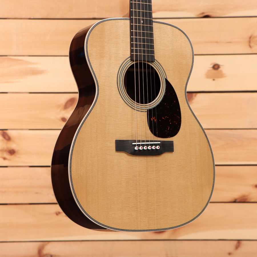 Martin OM28 Modern Deluxe acoustic guitar natural finish with tortoiseshell pickguard