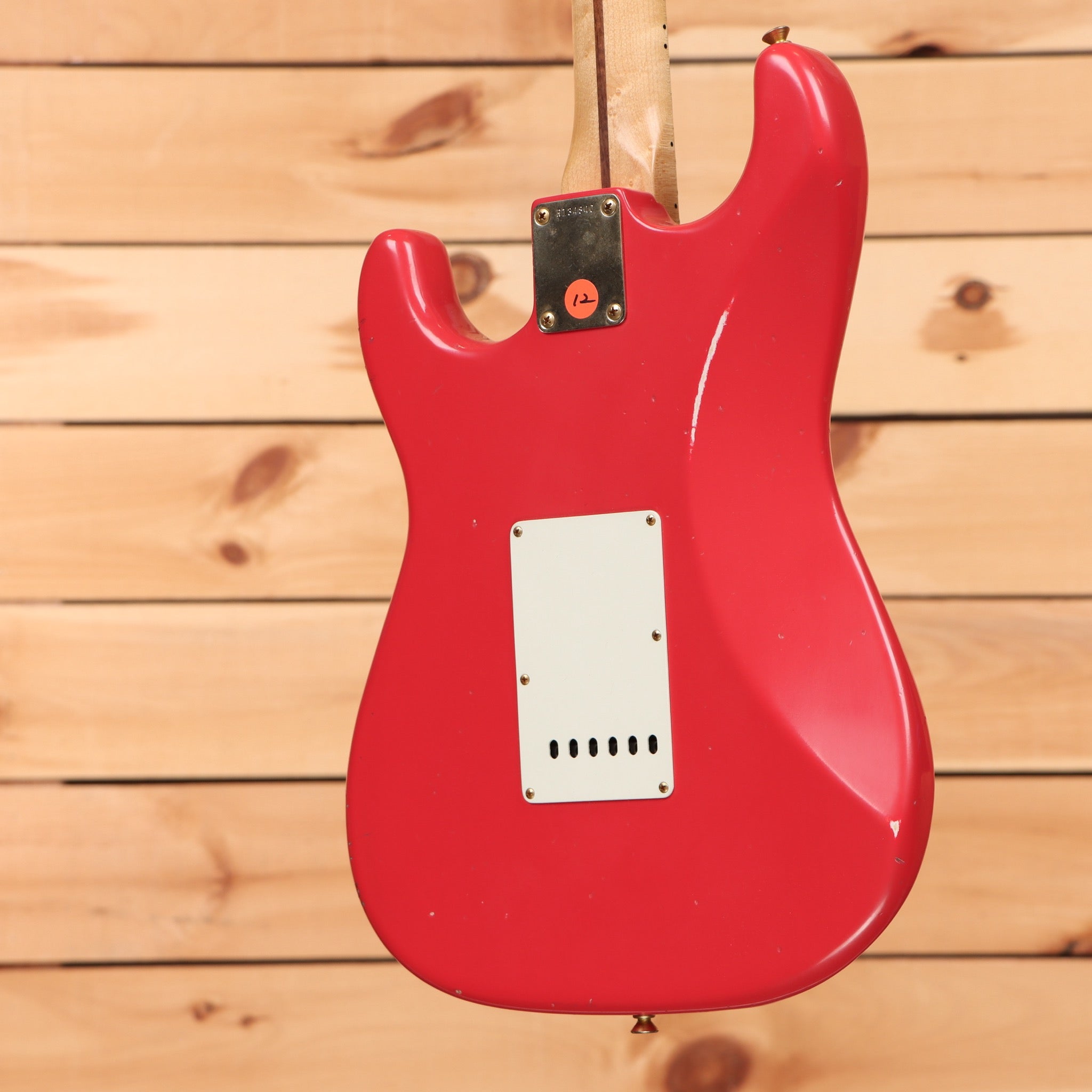 Fender Custom Shop 1957 Stratocaster electric guitar Fiesta Red Journeyman Relic with white pickguard