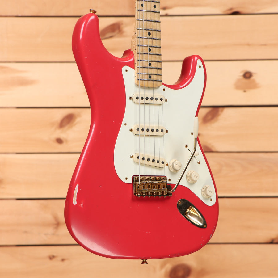 Fender Custom Shop Limited Greg Fessler Masterbuilt 1957 Strat Journeyman Relic electric guitar Fiesta Red with single-coil pickups