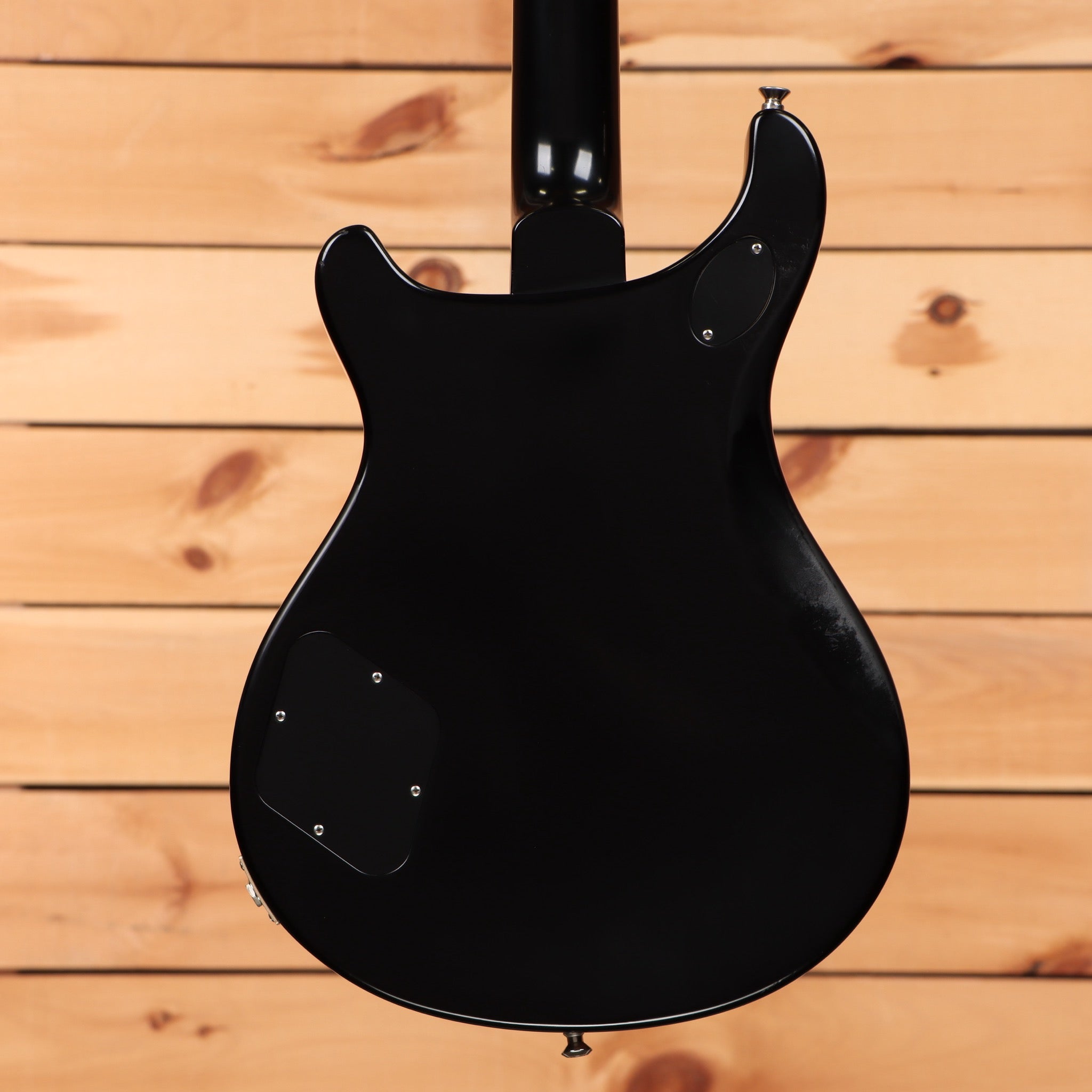 Paul Reed Smith McCarty 594 electric guitar Satin Black finish showing rear body with cavity cover plates