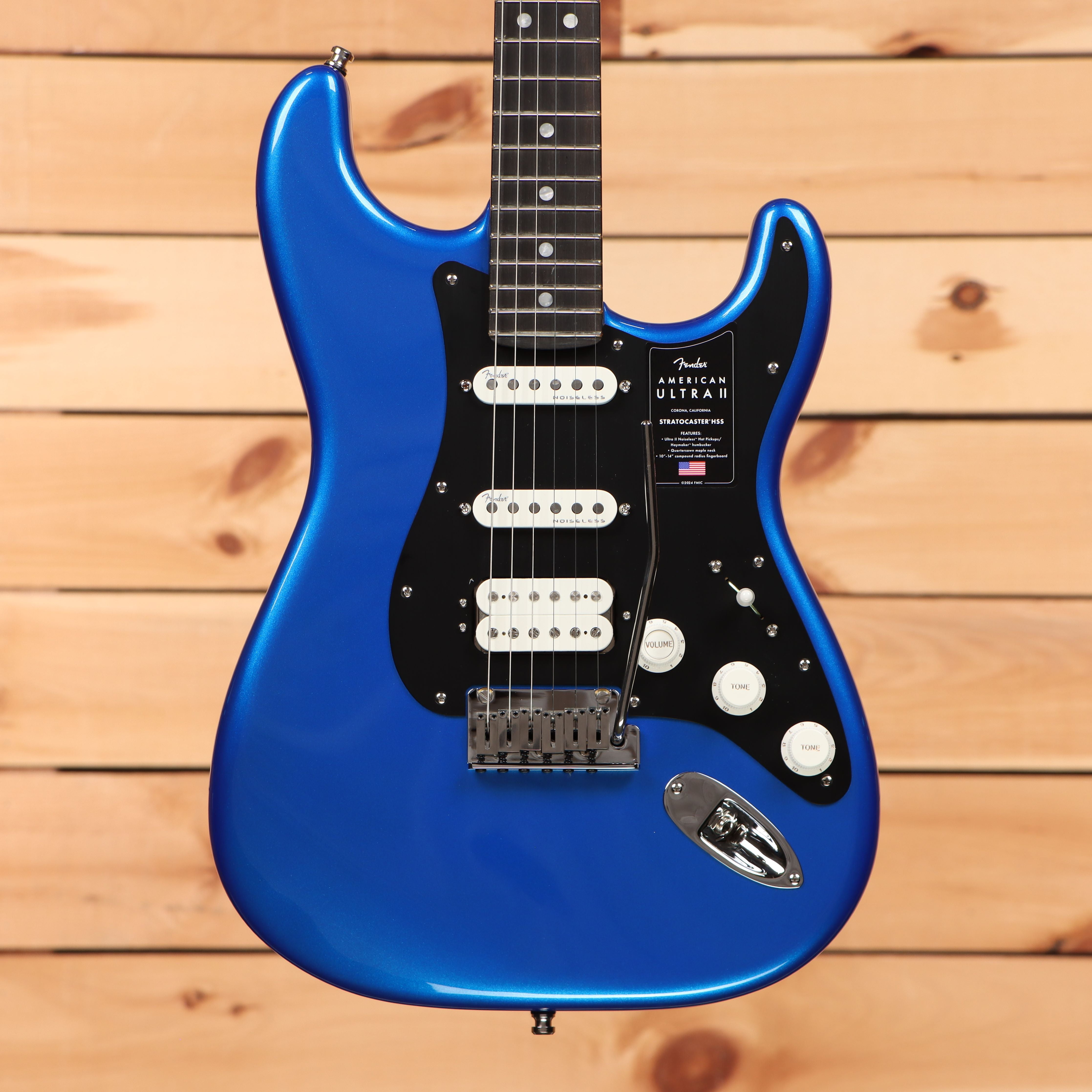 Fender American Ultra Stratocaster HSS electric guitar Noble Blue with three-pickup configuration and black pickguard