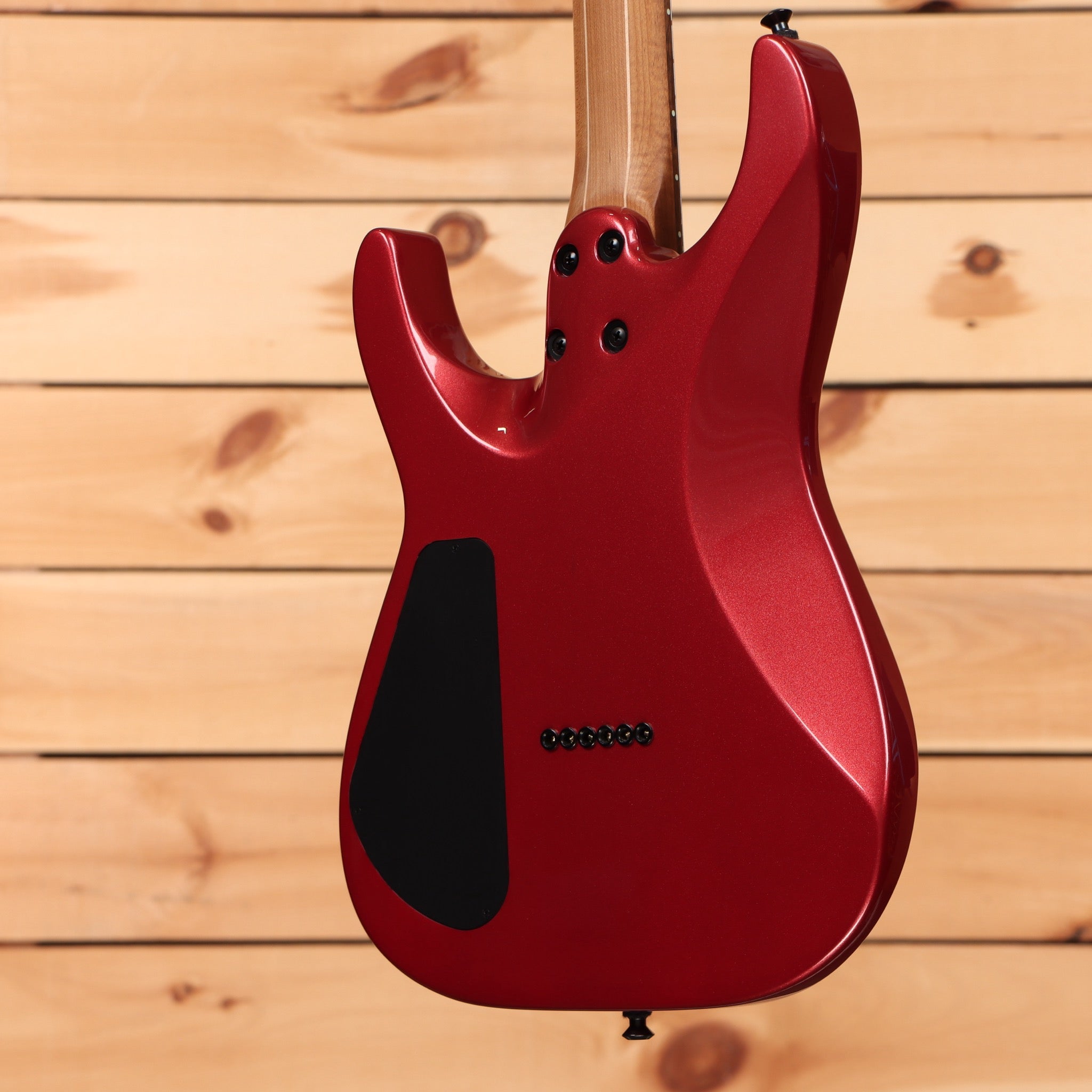Jackson American Series Virtuoso HT red crystal electric guitar with humbucker pickups and contoured body