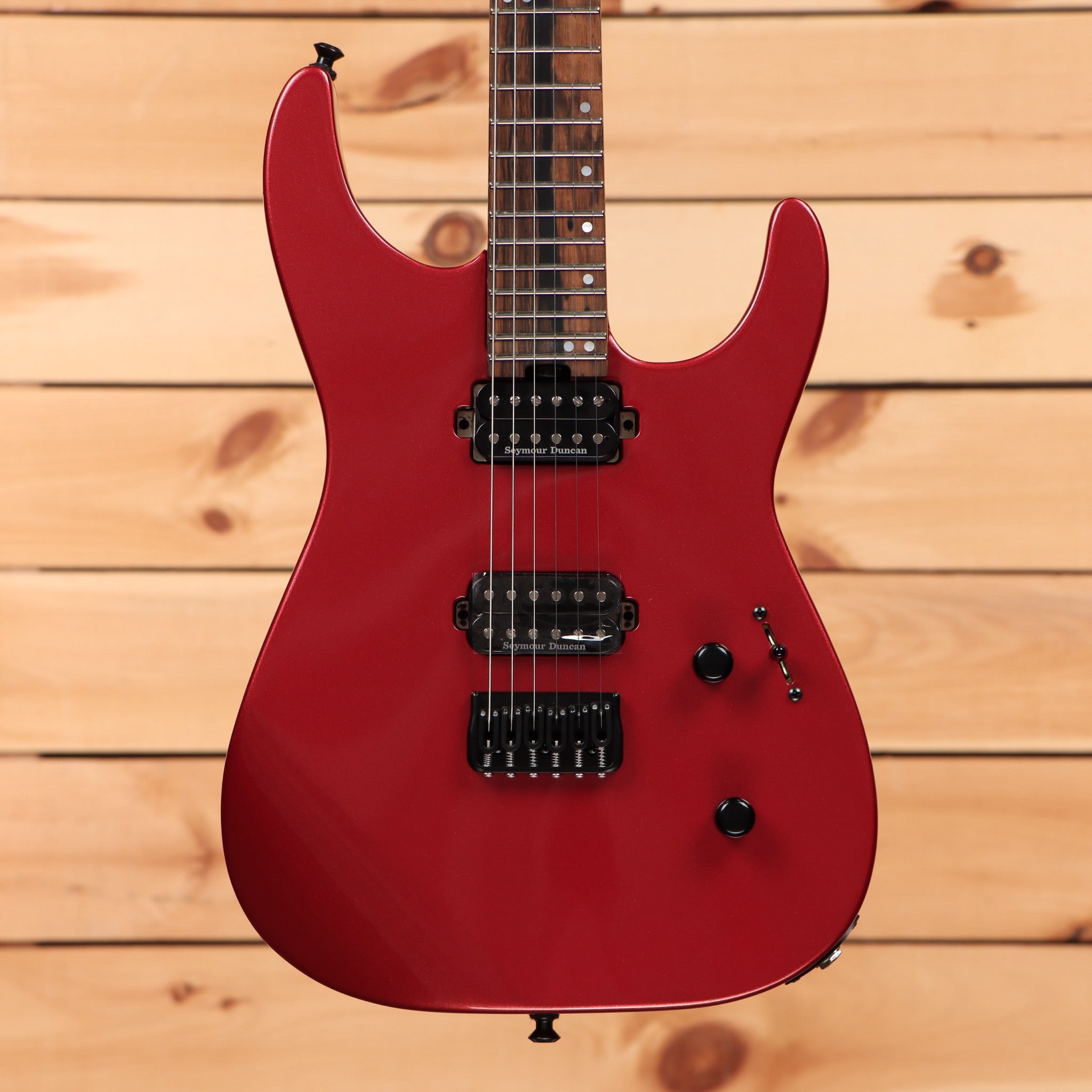 Jackson American Series Virtuoso HT red crystal electric guitar with dual Seymour Duncan humbuckers and rosewood fretboard